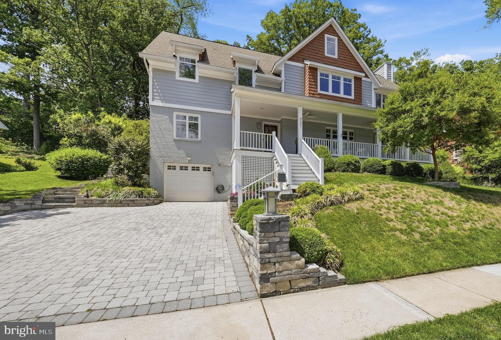 An exceptional 5-bedroom, 3.5 bathroom craftsman-style home in the heart of the beloved Broyhill Hills/Donaldson Run neighborhood. From the moment you arrive, the custom expanded paver driveway and attached one-car garage set the tone for everything this remarkable home offers.

Inside, an open, airy floor plan greets you with gorgeous hardwood floors and a spacious living area, expanded in 2022, designed for both everyday living and effortless entertaining. The kitchen is truly something special. Already outfitted with a premium suite of Thermador appliances and a Sub-Zero wine fridge, it has since been elevated further with brand-new cabinetry that delivers abundant storage and dedicated pantry space, everything a home cook or entertainer could ask for. Flow naturally from the elegant wet bar into the sun-filled formal dining room, and enjoy the added convenience of a large private office on the main level.

The primary suite is nothing short of a personal sanctuary, expanded to include a comfortable seating area, a beautifully appointed walk-in closet, and a spa-caliber bathroom complete with double vanities, a freestanding soaking tub, a double shower, and heated floors. Two additional bedrooms, a renovated full bath, and a flexible loft space round out the upper levels beautifully.

Head downstairs to a newly refreshed lower level featuring brand-new tile flooring throughout, a legal bedroom with an egress window, a full bathroom, and a generous bonus room ready to serve as a home gym, media lounge, or whatever suits your lifestyle.

Outside, a fully fenced and professionally terraced yard (2019) backs to Washington Golf & Country Club, offering a rare sense of privacy and calm. The large patio and deck are made for long summer evenings, and a custom shed keeps everything neatly tucked away.

The home has been thoughtfully maintained and upgraded for long-term peace of mind, including a Generac 20kW whole-house generator, a Carrier HVAC system with UV antibacterial filters, and a Thermador and Sub-Zero appliance suite that conveys.

Zoned for the Yorktown, Dorothy Hamm, and Taylor school pyramid, and just minutes from the trails, parks, and Potomac River views that make this neighborhood so special, with all the dining, shopping, and energy of Arlington and D.C. close at hand. Homes like this don't come around often. Come see it for yourself, you will be thrilled!