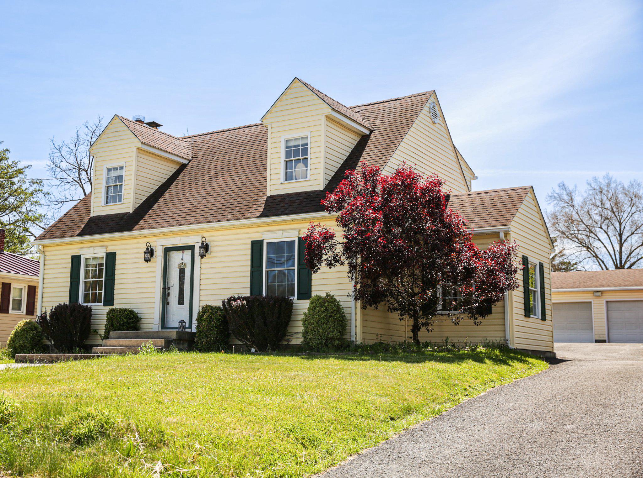 Charming Cape Cod-style home located right in the heart of Romney, WV! This adorable property offers a traditional layout with plenty of space, featuring a separate kitchen, dining room, and living room—perfect for everyday living and entertaining. The kitchen is spacious and offers an abundance of cabinetry, providing plenty of room for storage and meal prep. Enjoy the convenience of main-level laundry and a bright, inviting mudroom/breezeway filled with sunlit windows, creating the perfect transition space for all seasons.

This home also features a nice, spacious 2-car garage along with a matching storage shed, offering plenty of room for parking and additional storage.

The partially finished basement adds even more versatility, offering space that can be used as an additional bedroom or a cozy family entertainment room, while the other side provides ample room for storage.

Step outside to a nice, level yard—perfect for enjoying the outdoors! The backyard features a stone patio ideal for gatherings and events, along with a designated fire pit area for relaxing evenings. There is plenty of space for children to play, making it a great setting for creating lasting memories.

With its classic charm and functional design, this home provides comfortable living both inside and out. Conveniently located near local shops, dining, and amenities, this property is ideal for those looking to enjoy small-town living with easy access to everything Romney has to offer. Don’t miss your chance to make this cute and cozy home your own!