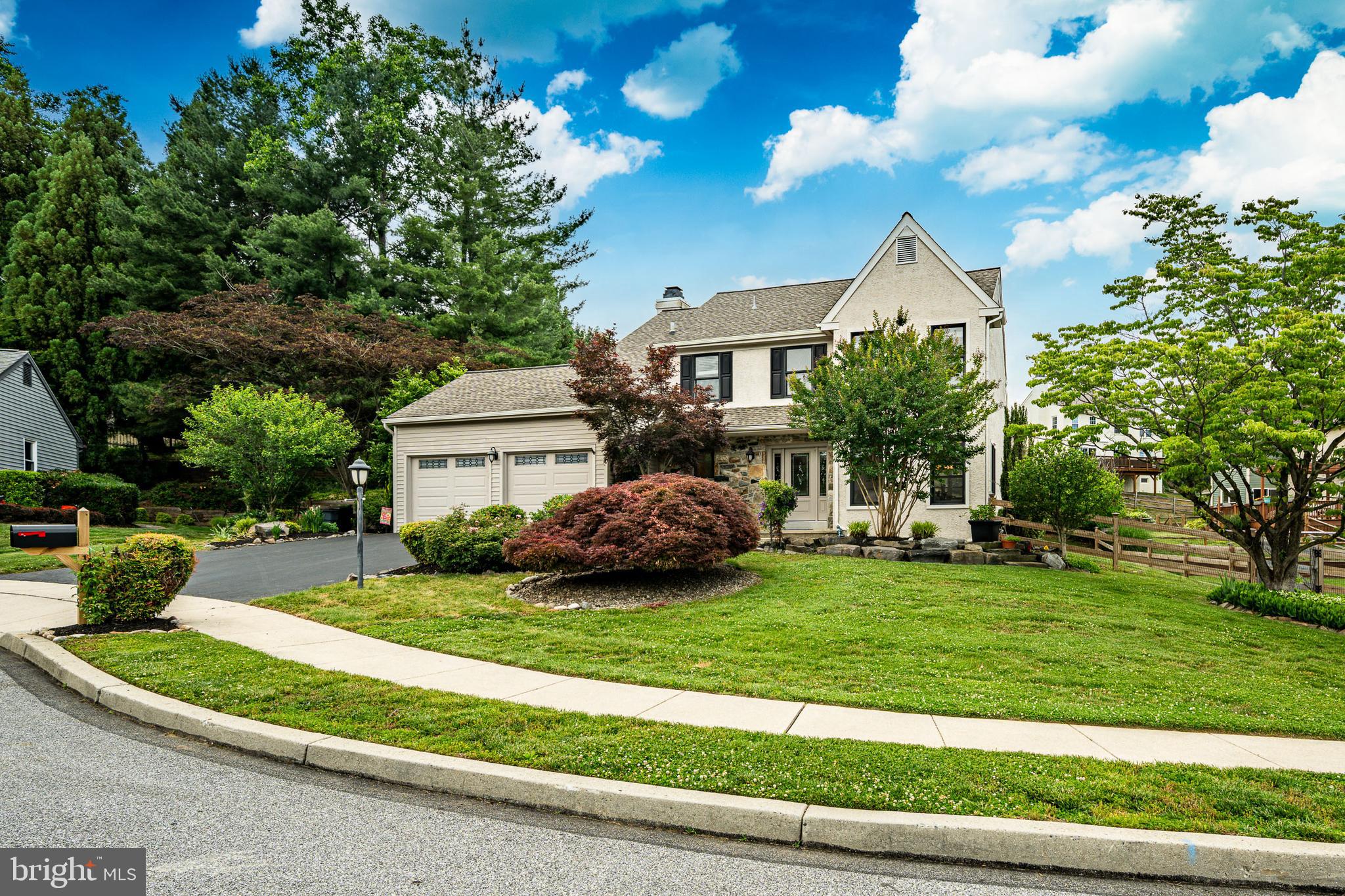 Tucked away at the end of a quiet cul-de-sac, 105 Grace Lane offers the perfect blend of timeless elegance, neighborhood charm, and exceptional outdoor living. Surrounded by professionally designed and meticulously maintained landscaping, this beautiful 4-bedroom, 2 full and 1 half bath home creates a private retreat where every season can be enjoyed.
From the moment you arrive, the lush gardens, mature plantings, and inviting curb appeal set the tone for what awaits inside. Rich hardwood flooring flows throughout the main level, where a classic and functional floor plan offers the traditional spaces today's buyers continue to love. Sun-filled living areas provide the perfect setting for everyday living and effortless entertaining.
One of the home's most cherished features is the three-season screened porch, where morning coffee, evening conversations, and peaceful views of the surrounding landscape become part of your daily routine. The finished basement expands your living space, offering endless possibilities for recreation, a home office, fitness area, or media room.
Upstairs, four generously sized bedrooms provide comfortable accommodations, including a spacious primary suite. Every room reflects the pride of ownership evident throughout the home.
Pre-inspected and truly move-in ready, 105 Grace Lane offers a rare opportunity to enjoy a beautifully maintained home in an idyllic setting—where neighbors wave hello, children play safely on the cul-de-sac, and the feeling of home begins the moment you arrive.