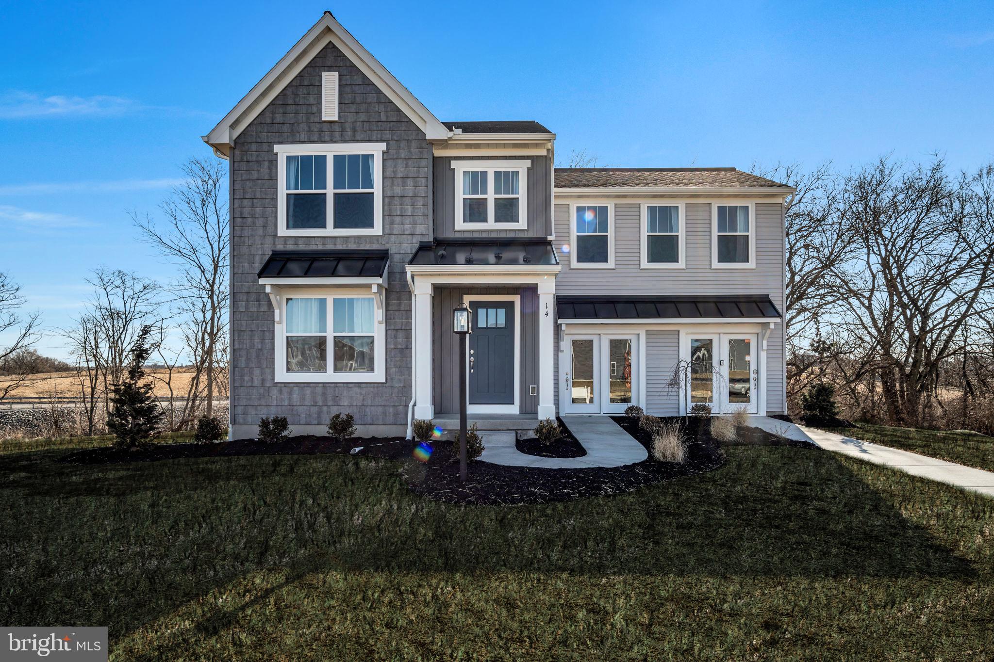 Welcome to this beautifully upgraded 3-bedroom, 2.5-bath home offering 1,687 square feet of thoughtfully designed living space in Hays Landing. This Willow floor plan combines modern finishes with functional design in a prime location.

The open-concept main level features luxury vinyl plank flooring throughout the foyer, kitchen, living room, and sunroom, creating a seamless and stylish flow. The upgraded Heritage kitchen showcases quartz countertops, a single-bowl Kraus workstation sink, stainless steel appliances including a refrigerator, dishwasher, and electric range, upgraded cabinet hardware, crown molding, shiplap backsplash, and an expanded island perfect for entertaining.

Enjoy additional living space in the bright sunroom with vaulted ceiling, plus a 14’ x 10’ easy-care deck overlooking the backyard. A walk-out basement provides excellent future finishing potential and added convenience.

Upstairs, the owner’s suite offers a beautifully upgraded bath with double bowl vanity, adult-height cabinetry, brushed nickel fixtures, elongated comfort-height toilets, and a 60” subway tile shower with seat and hinged glass door. Additional highlights include modern interior trim, shiplap accent wall, upgraded lighting fixtures, NEST thermostat, whole-house humidifier, and a modern railing system.

With enhanced exterior details, metal roof accents, upgraded front door and hardware, and thoughtful design selections throughout, this home offers both curb appeal and elevated interior style.

Move-in ready and packed with upgrades—schedule your showing today!