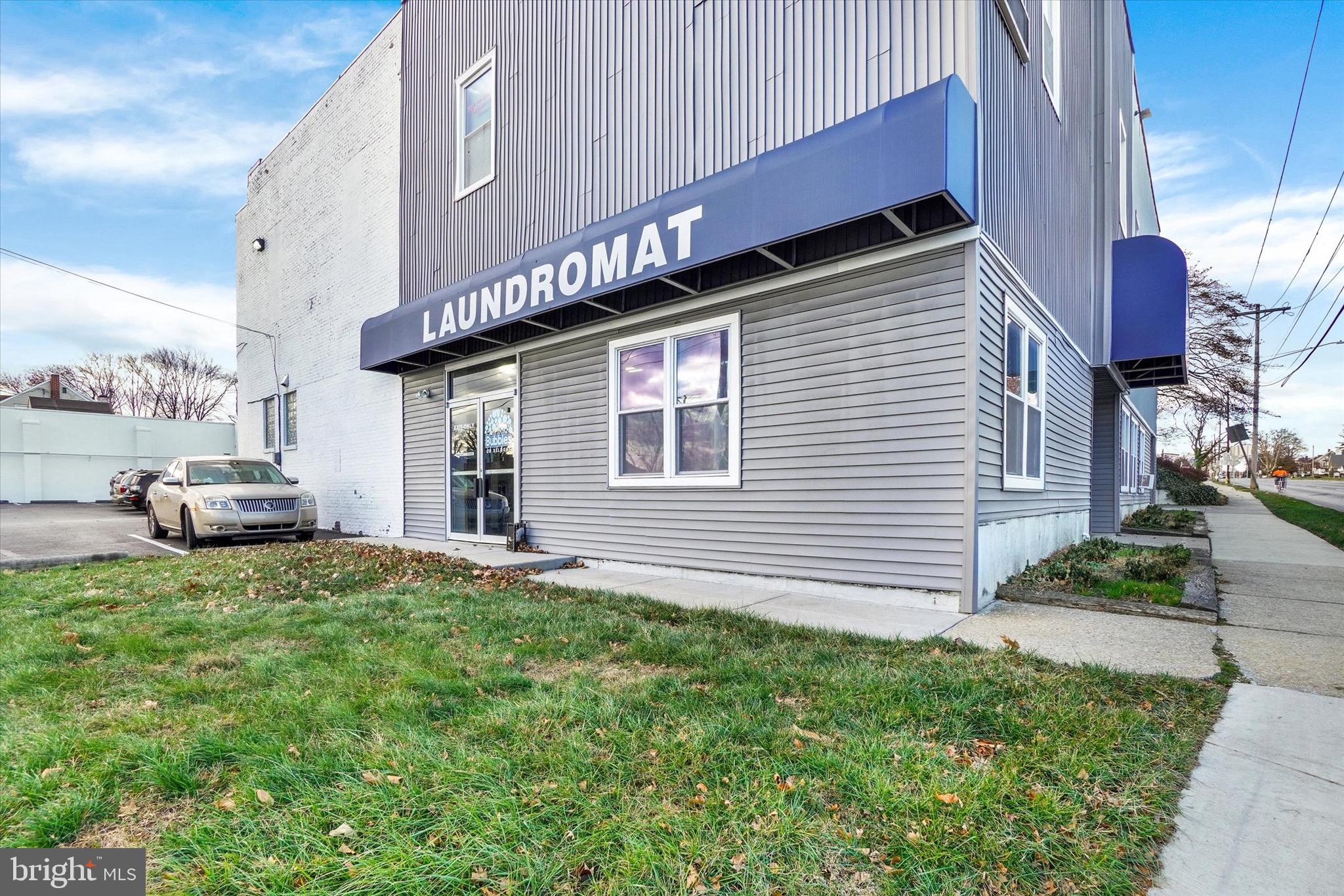 Prime location with exceptional visibility and unmatched traffic count, offering high desirability for a wide range of business opportunities. This versatile mixed-use property currently features several large spaces that can be leased to multiple tenants or owner use, including a laundromat, a private exclusive gym, a private yoga studio, vacant front space for a small retailer, and a spacious 2,500 sq. ft. apartment. Additional value includes 12 dedicated parking spaces an outstanding advantage for both tenants and customers.