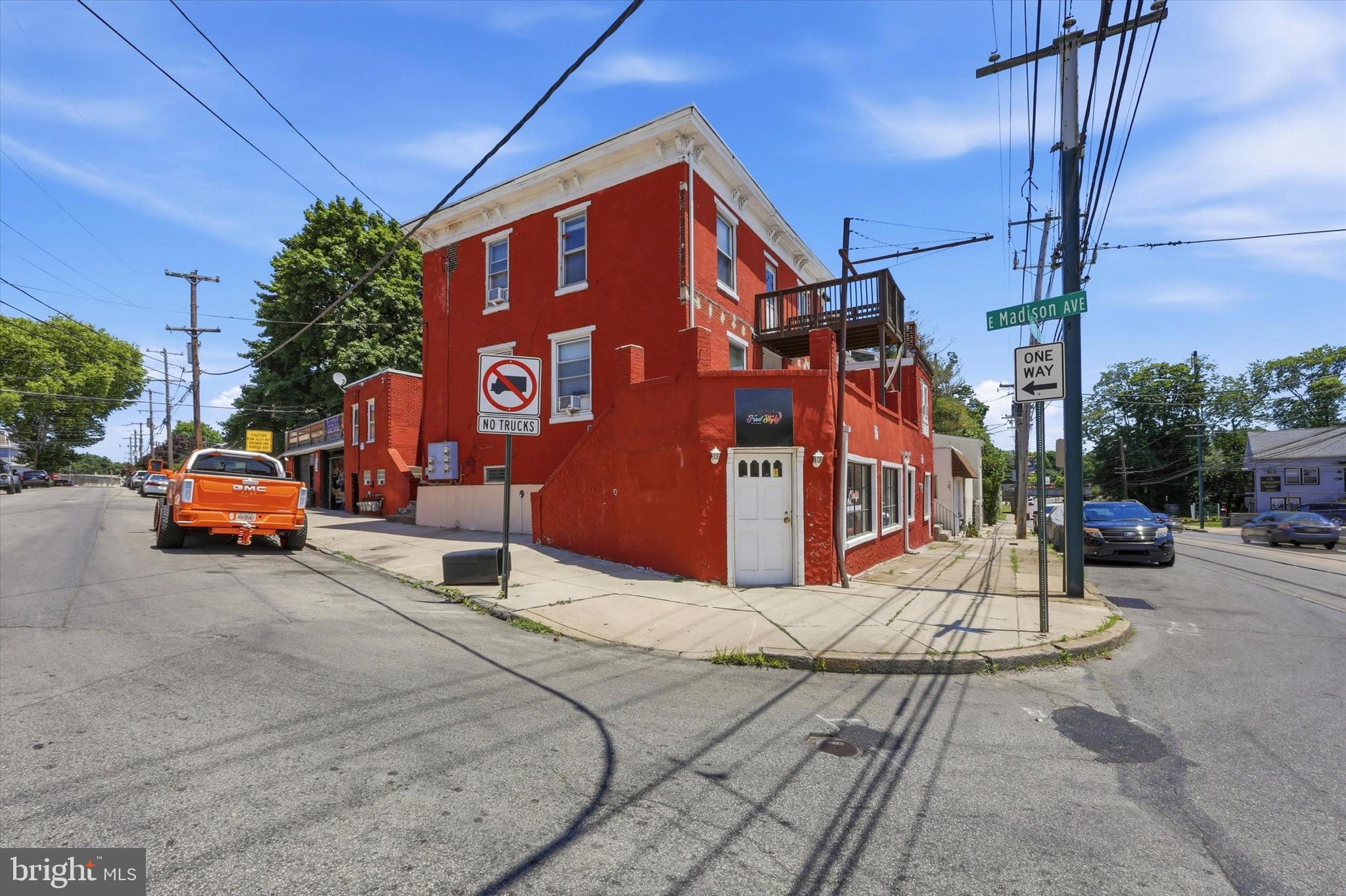 401 S Springfield Road presents a rare opportunity to acquire a mixed-use investment property in the heart of Clifton Heights, Delaware County. The building consists of 5 total units, including 2 established commercial spaces at street level and 3 residential apartments on the upper floors, creating a diversified income stream with both stability and upside potential. The commercial component is anchored by a long-standing hair salon and an auto detailing and vehicle wrap business, providing consistent tenancy and strong visibility along the heavily traveled Springfield Road corridor. Above the commercial spaces are three residential units consisting of an occupied two-bedroom apartment (Unit 1A), a recently renovated one-bedroom apartment (Unit 1B) featuring a brand-new kitchen and modern updates, and a spacious third-floor two-bedroom apartment (Unit 2B) that offers significant value-add potential through future renovation. The property currently generates $6,090 per month in gross rental income, including projected rent for the newly renovated Unit 1B. Pro forma rents projected between $6,850 and $7,200 per month. This asset offers investors an attractive combination of in-place cash flow, diversified tenancy, and achievable upside through strategic improvements. With strong rental demand in Delaware County and limited mixed-use inventory available for purchase, 401 S Springfield Road represents an excellent opportunity for both seasoned investors and owner-operators seeking long-term value creation.