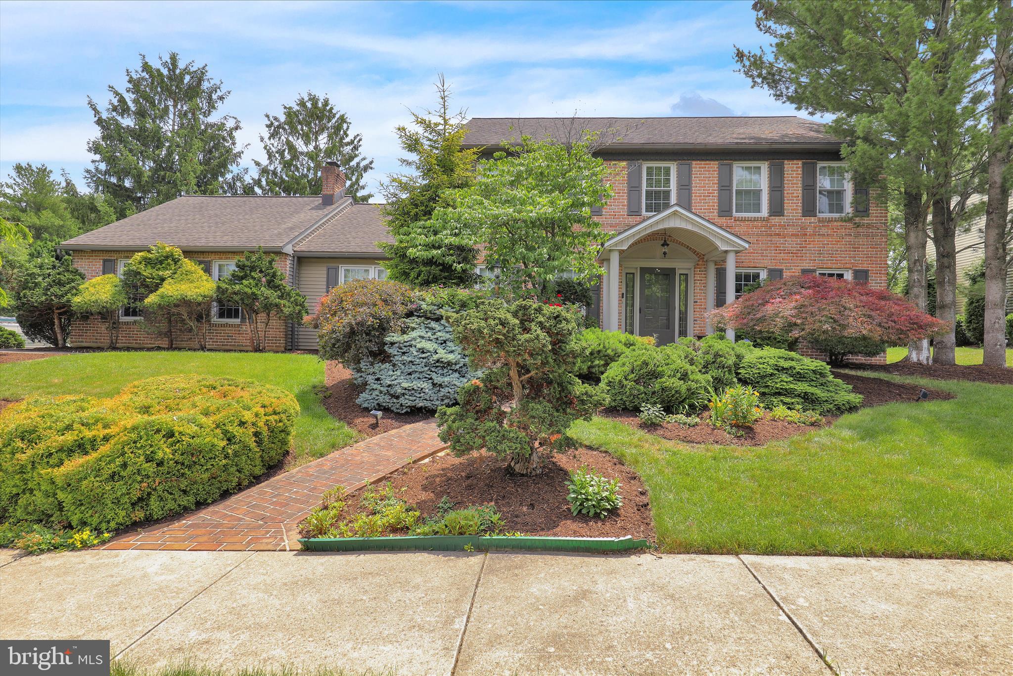 Don’t miss out on this beautiful brick  4-bedroom Colony Park home in Wilson School District. Situated on a gorgeous corner lot that inculdes a covered patio and fenced back yard.  
The main level offers a spacious layout including a living room, formal dining room, and a study with built-in office space and hardwood floors. The family room is a true highlight with its vaulted ceiling, skylights, Brazilian Walnut hardwoods, and a brick gas fireplace flanked by custom cabinetry. In the kitchen, you’ll find granite countertops, stainless steel appliances, ceramic tile flooring, a pantry, and a charming bay window with a seat. This level also includes a laundry room and a half bath.
Upstairs, the home features four bedrooms and two full baths with ample closet space, including a master suite with a dual sink vanity and a walk-in tile shower. The fully finished basement provides over 900 additional square feet of living area, complete with a wet bar, half bath, cedar closet, and significant storage space. Modern systems include a tankless water heater and a water softener with reverse osmosis.
Outdoor living is exceptional on the covered brick veranda, which features a built-in grill and granite counters perfect for entertaining. The large, fenced-in backyard is beautifully landscaped and includes a storage shed. Move-in ready and conveniently located near schools, shopping, Grings Mill hiking trail, and Blue Marsh, this home also offers easy access to major bypass networks for commuting to Allentown, Harrisburg, Lancaster, and Philadelphia. Schedule your showing today!