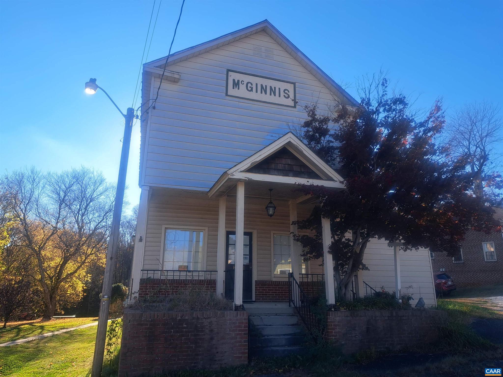 LISTED BELOW TAX VALUE ($75,300) Blank canvas. New central a/c and heat. Two bedrooms upstairs but steps need to be put in place to access. At this time the upstairs is only assessable by ladder. This property was bought to turn into a rental but the owners must sell due to unrelated issues. Turn this property into an Airbnb, personal property, rental or retail. Lots of possibilities. The property is connected to public water and is on a shared septic with the next door post office and home in the rear. Remaining building products in the property are negotiable. Plumbing is roughed in and not connected. Listing agent is related to the seller