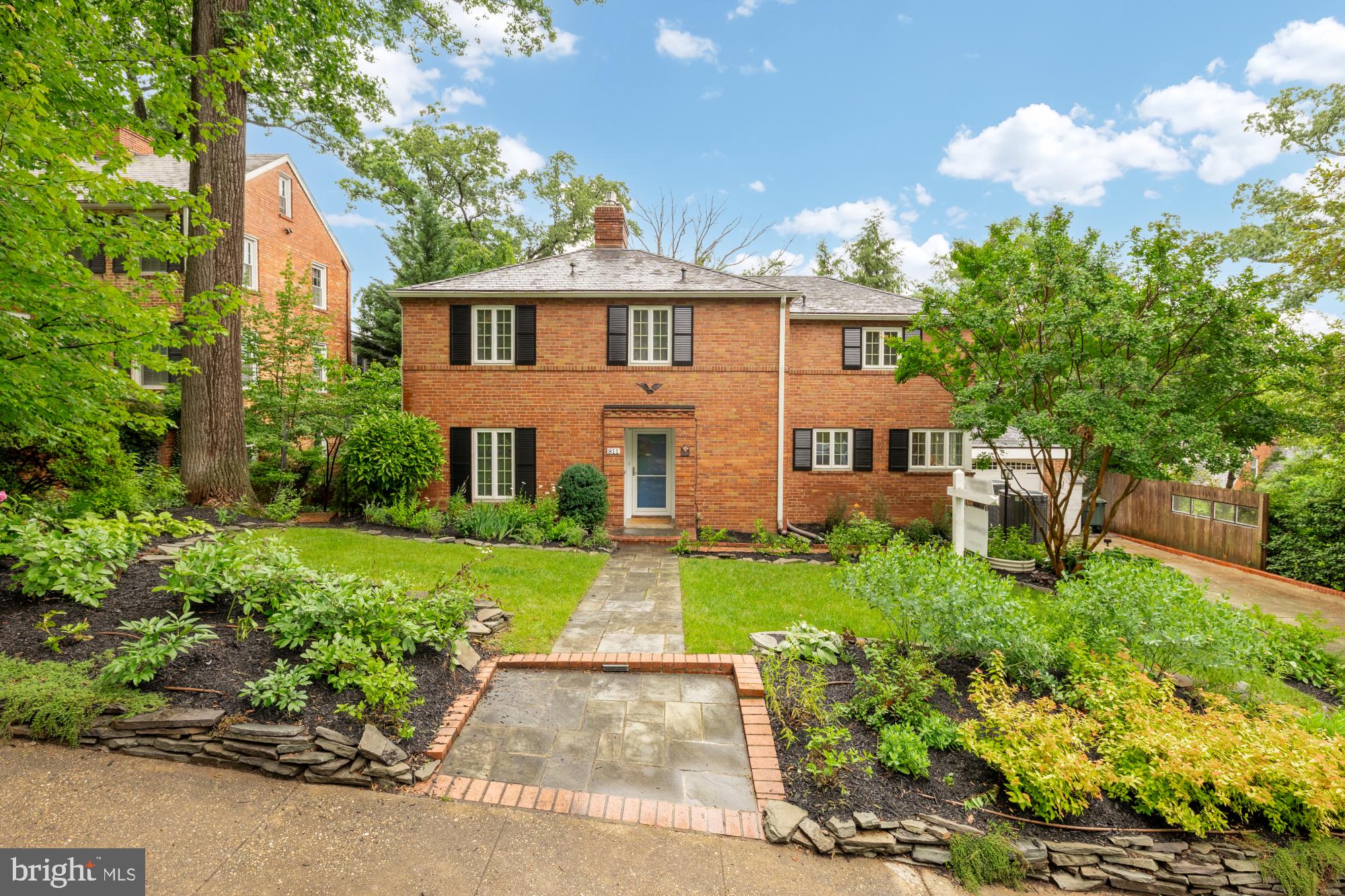 Nestled on a quiet, tree-lined street in Aurora Hills, this charming colonial offers the perfect blend of classic character and everyday comfort. With four bedrooms, three full bathrooms, and a thoughtful layout across three levels—including a walkout basement—this home feels warm, welcoming, and lived in, in all the right ways.

Mature landscaping and timeless curb appeal set the tone as you approach, while inside, hardwood floors add warmth and texture throughout the main living spaces. The sun-drenched living room invites slow mornings with coffee and conversation, while the dining area feels just right for lively dinners and holiday celebrations. The kitchen balances form and function, with just enough room to cook and gather without ever feeling crowded.

Downstairs, the walkout basement offers a flexible retreat—think movie nights, a quiet office, or a cozy guest suite—complete with its own full bathroom. Upstairs, the bedrooms are peaceful and private, each offering a sense of comfort and calm.

Out back, the yard feels like a hidden pocket of nature, ideal for grilling, gardening, or simply unwinding under the trees. A detached garage and private driveway provide plenty of space for parking and storage, while the dual-zoned HVAC keeps the home comfortable year-round.

Situated in a location that’s hard to beat, you're just minutes from the energy of DC, the charm of Alexandria, the shops and dining of Shirlington, all accessible by your choice of 4 Metro stops; just moments away from H2Q, National Landing and more! Life here is easygoing, connected, and full of character—just like the home itself.