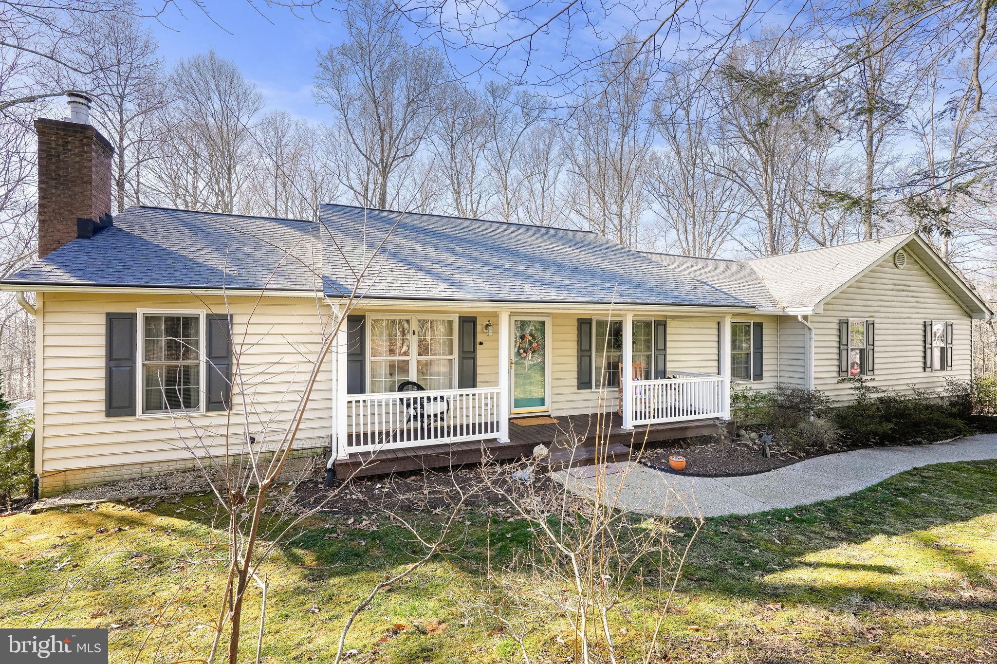 Did I say 4 CAR ATTACHED GARAGE?  I sure did!  Looking for 1 LEVEL LIVING?  Prepared to be truly wowed by this ranch style home in the heart of Huntingtown!   Meticulously cared for, this home offers it all!   ROOF replaced in 2022, HVAC replacements in 2021 & 2022 & driveway redone in 2021, BRAND NEW Kitchen appliances...NO HOA...1.64 ACRES of PRIVACY...At the end of a CUL-DE-SAC...Zoned for award winning HUNTINGTOWN HIGH SCHOOL...2 minutes to RT 4 for EASY COMMUTE to DC, Annapolis, AAFB, PAX River etc.  The rear entry garage has unheard of amounts of space for all of your toys!  As a bonus there is an enclosed workshop in the back of one of the bays.  The main level welcomes you into a  quaint family room, onto a formal dining room & a well appointed eat-in kitchen with granite counters & tile backsplash.   4 bedrooms (including Primary,) one main bedrooms has it's own attached bath,  & there is another full bath for the other bedrooms.  Down the hall to the LUXURIOUS primary suite which includes a huge shower with glass surround, a beautiful walk in closet with built-ins, another large closet, & a room with 2 walls of closets which could also be used as another bedroom.   The main level also has rich & warm REAL hardwood flooring throughout.   The lower level you offers a huge entertaining space!  Large recreation space with a gas fireplace, a bar, & a beautifully updated half bath.  Relax on your back deck that opens into the woods for total privacy.    Located in beautiful Calvert County which is surrounded by the Chesapeake Bay on 1 side, & the Patuxent River on the other- bring your boat or kayak, or relax on one of many beaches throughout the county.  Small town feel, less traffic, but with all the amenities you need.  This is a home you just HAVE to see for yourself.  It's not like any other on the market!