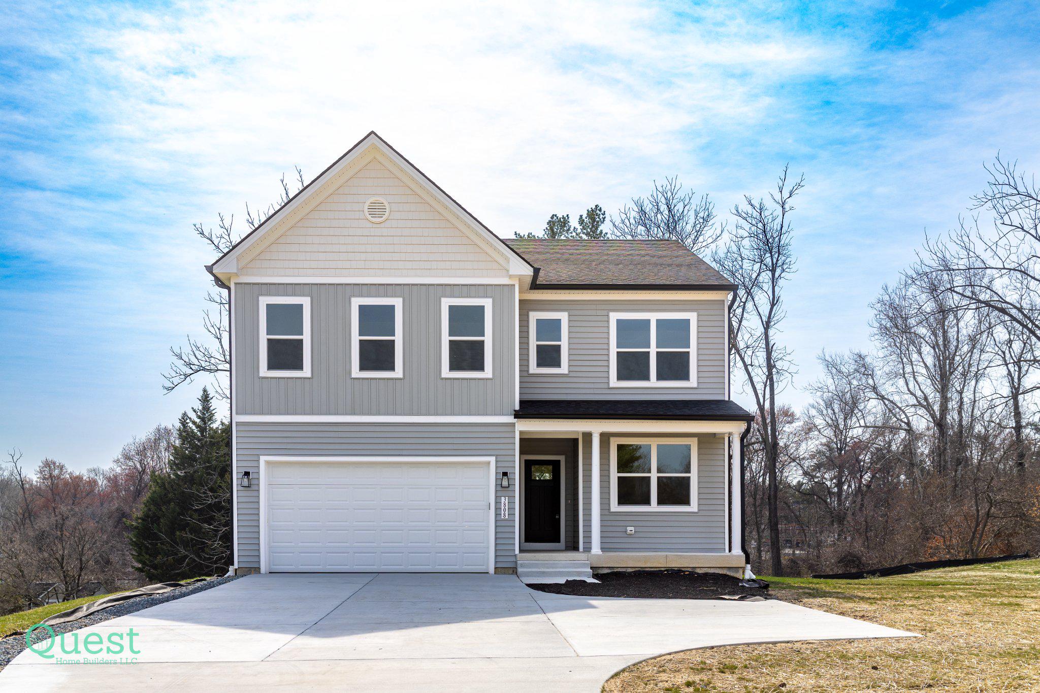 This exquisite new construction home by Quest Home Builders, seamlessly blends Colonial and Craftsman architectural styles, offering a sophisticated yet inviting atmosphere. Spanning 0.65 acres, the property features an open floor plan that enhances the flow of natural light throughout the spacious living areas. The heart of the home is the kitchen, complete with a large island, quartz and a butler's pantry, perfect for culinary enthusiasts and entertaining guests. Enjoy the comfort of four generously sized bedrooms, including a luxurious owner's suite with a large walk-in shower with 2 shower heads. The owner's suite also features 2 walk-in closets and 2 bathroom vanities. Recessed lighting and high-end finishes elevate the interior, while the family room off the kitchen creates a cozy gathering space. Additional highlights include an upper-floor laundry for convenience and an attached garage with ample space. Experience a lifestyle of elegance and comfort in this meticulously crafted residence, where every detail has been thoughtfully designed for modern living. Embrace the opportunity to make this stunning property your new home. No HOA here!