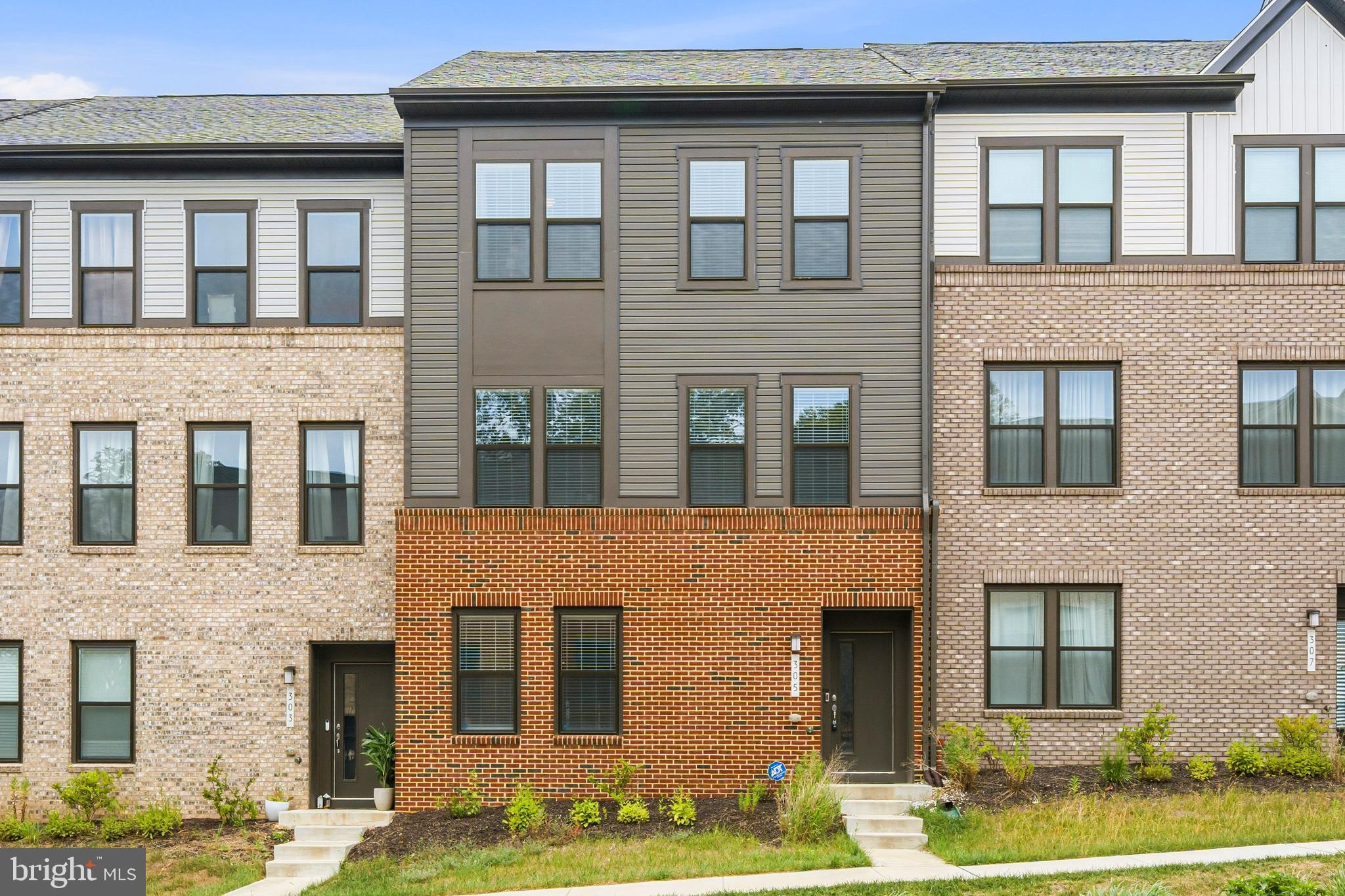 Welcome to 305 Backwater Way, a stunning four-level townhome located in the highly sought-after Watershed community of Laurel. Featuring 4 bedrooms, 3 full bathrooms, and 2 half bathrooms, this beautifully designed home offers the perfect blend of modern living, flexible spaces, and exceptional community amenities.

The entry level features a private bedroom and half bathroom, ideal for guests, multigenerational living, or a home office. The main level boasts an open-concept floor plan with spacious living and dining areas, a well-appointed kitchen, and a convenient half bath, creating an inviting space for both everyday living and entertaining.

The upper bedroom level includes a spacious primary suite with an en-suite bath, additional bedrooms, and another full bathroom. The impressive fourth-floor loft provides a versatile bonus space perfect for a family room, home office, fitness area, or entertainment room. Complete with a private balcony, this level offers the perfect retreat to relax and enjoy the outdoors.

Additional highlights include a rear-entry two-car garage, ample storage, and contemporary finishes throughout. As a resident of Watershed, you'll enjoy resort-style amenities including a clubhouse, fitness center, swimming pool, playgrounds, walking trails, dog parks, and beautifully maintained green spaces.

Ideally located near Fort Meade, NSA, BWI Airport, MARC commuter rail, and major routes including I-95, Route 32, and Route 295, this home offers easy access to Baltimore, Washington, D.C., shopping, dining, and entertainment. Experience the perfect combination of comfort, convenience, and community at 305 Backwater Way.