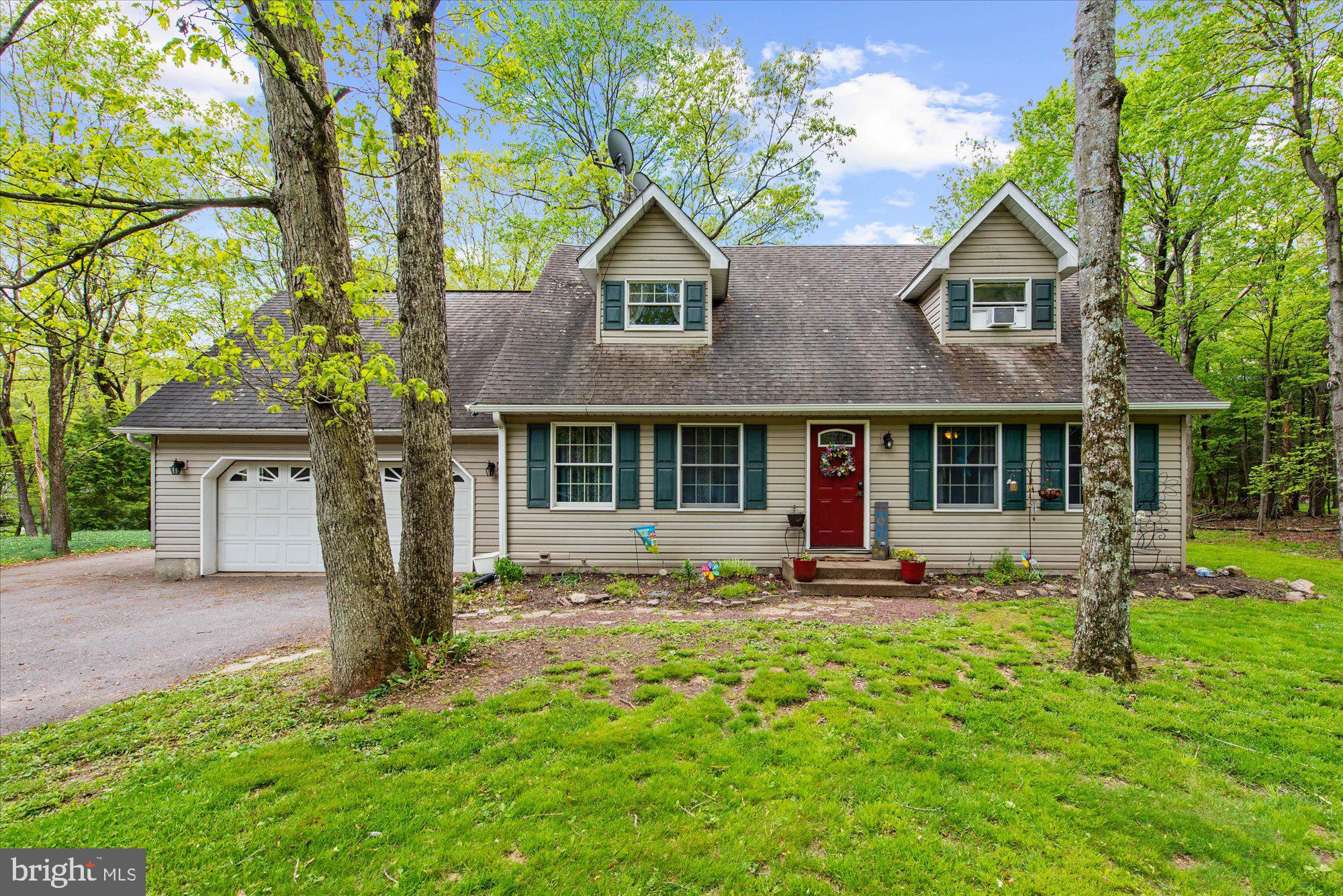 Sanctuary tucked within the charming community of Jim Thorpe. This inviting home offers a harmonious blend of spacious interiors and an expansive outdoor setting, ideal for anyone seeking tranquility, privacy, and room to grow. The thoughtfully designed layout features 2,256 square feet of living space, providing generous room for both relaxation and entertaining. Inside, you’ll find three spacious bedrooms, an additional bonus space, and two and a half bathrooms, ensuring convenience for both residents and guests. Step outside to your private retreat: a two-tiered deck with a screened-in, covered section, perfect for enjoying the peaceful sounds of nature. Whether hosting friends or unwinding with family, this outdoor oasis is designed for year-round enjoyment. Located at 12 Audrey Lane, this home offers a lifestyle of peaceful living with effortless access to the unique attractions, outdoor recreation, and natural beauty that make Jim Thorpe, PA so special. This residence presents a rare opportunity to enjoy the best of both worlds, a vibrant community paired with the privacy and amenities of a distinguished home. This home includes a 12 Month Warranty Program to Buyer.