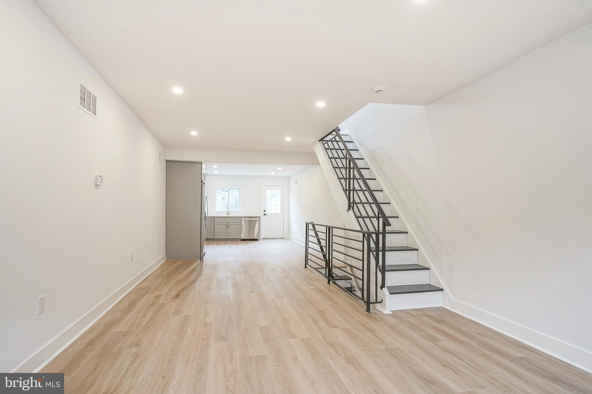 Welcome to 817 Pierce Street, a beautifully updated 2-bedroom, 1-bath home located in the heart of the highly sought-after East Passyunk neighborhood. This charming property blends modern finishes with everyday comfort, all within walking distance to some of Philadelphia’s best dining and entertainment. Step inside to find luxury vinyl plank flooring flowing seamlessly throughout the home, creating a clean and contemporary feel. The kitchen is a standout feature, complete with sleek grey shaker cabinets offering ample storage, quartz countertops, and newer stainless steel appliances—perfect for both everyday living and entertaining. The full bathroom has been thoughtfully designed with custom floor-to-ceiling tile and a stylish new vanity. Upstairs, you’ll find two spacious bedrooms, each offering generous closet space and natural light. The home also features a super clean, full basement equipped with a washer and dryer, providing plenty of additional storage space. Out back, enjoy a generously sized private yard—ideal for relaxing, gardening, or hosting gatherings. Located just steps from Passyunk Avenue, you’ll be surrounded by some of the city’s best restaurants, bars, and local hotspots. You’re also within close proximity to the Italian Market, Bok Bar, and so much more, making this location truly unbeatable. Don’t miss your chance to own a move-in-ready home in one of Philadelphia’s most vibrant neighborhoods!