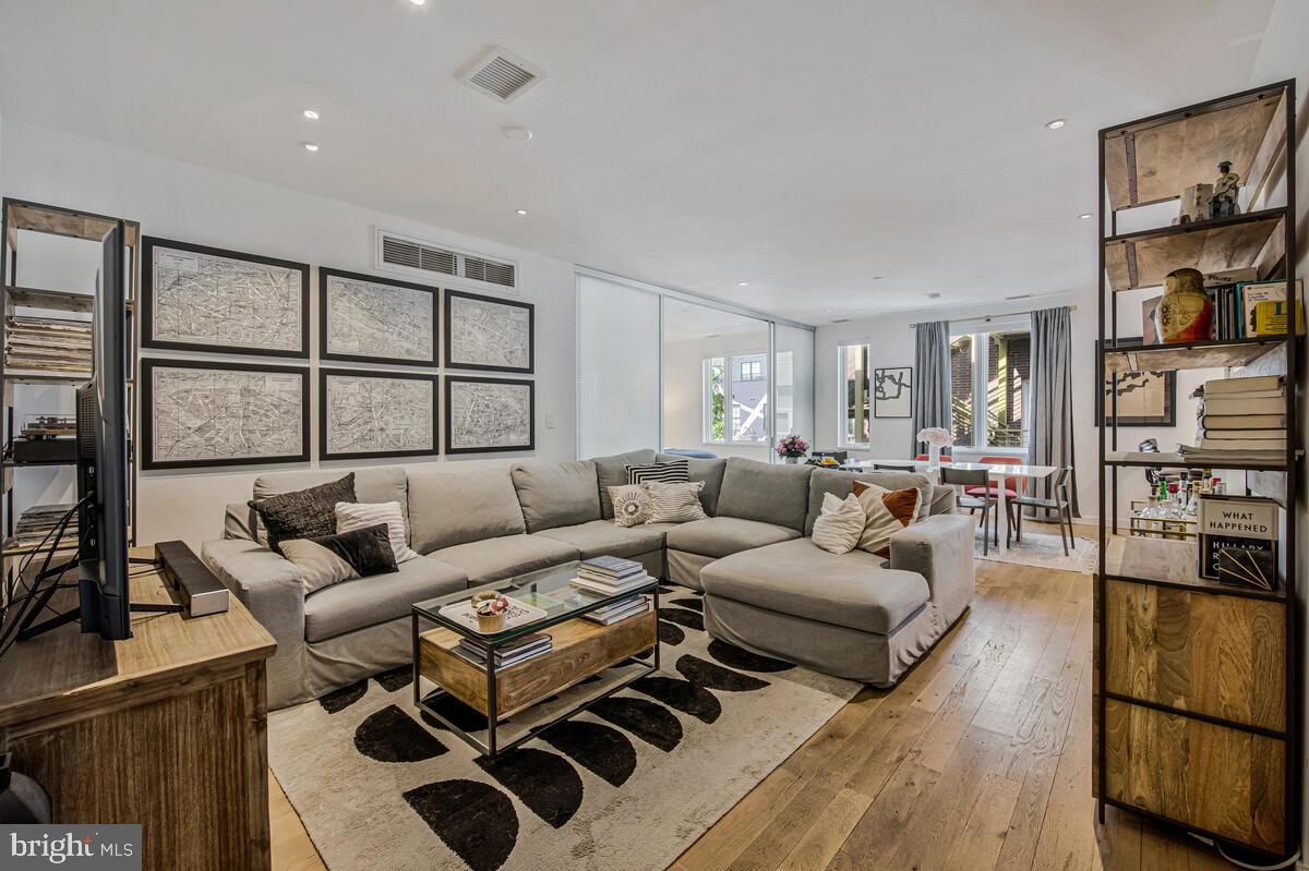 Price to sell does not even capture what a magnificent deal awaits you in 1,200 sqft of refined, boutique living. This 1Bed/Den/2Bath condo checks every box for the urban dweller: An open floor plan designed for those who live to entertain, bedrooms that house queen/king beds and home offices, luxurious finishes (such as the bedroom double doors that allow light to stream throughout), more closet space than you know what to do with, and an entry mudroom with designer flair.  I could go on-and-on about the cook's kitchen, the natural sunlight from the southern and western exposure, or the additional storage unit, but best to come and see for yourself. You may also want to sneak a peek at the green rooftop deck with views of the Washington Monument. Convenient to Whole Foods, restaurants, shops and the U Street Metro.