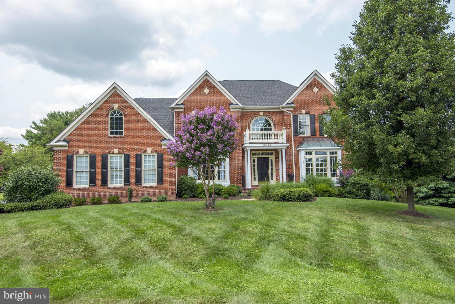 Absolutely fabulous NV Homes brick colonial w/9' ceilings, hdwd flrs on main & upper, spectacular,private setting w/pool and huge, level 2 acre yard.  Exceptional flr pln w/2 story foyer, step down FR w/gas FP & beamed ceiling, terrific updated kitchen w/sunroom style breakfast area, laundry/mud room. Oversized master suite w/sitting area + 2 BIG walk-in closets. Daylight w/o lower level! Hurry!