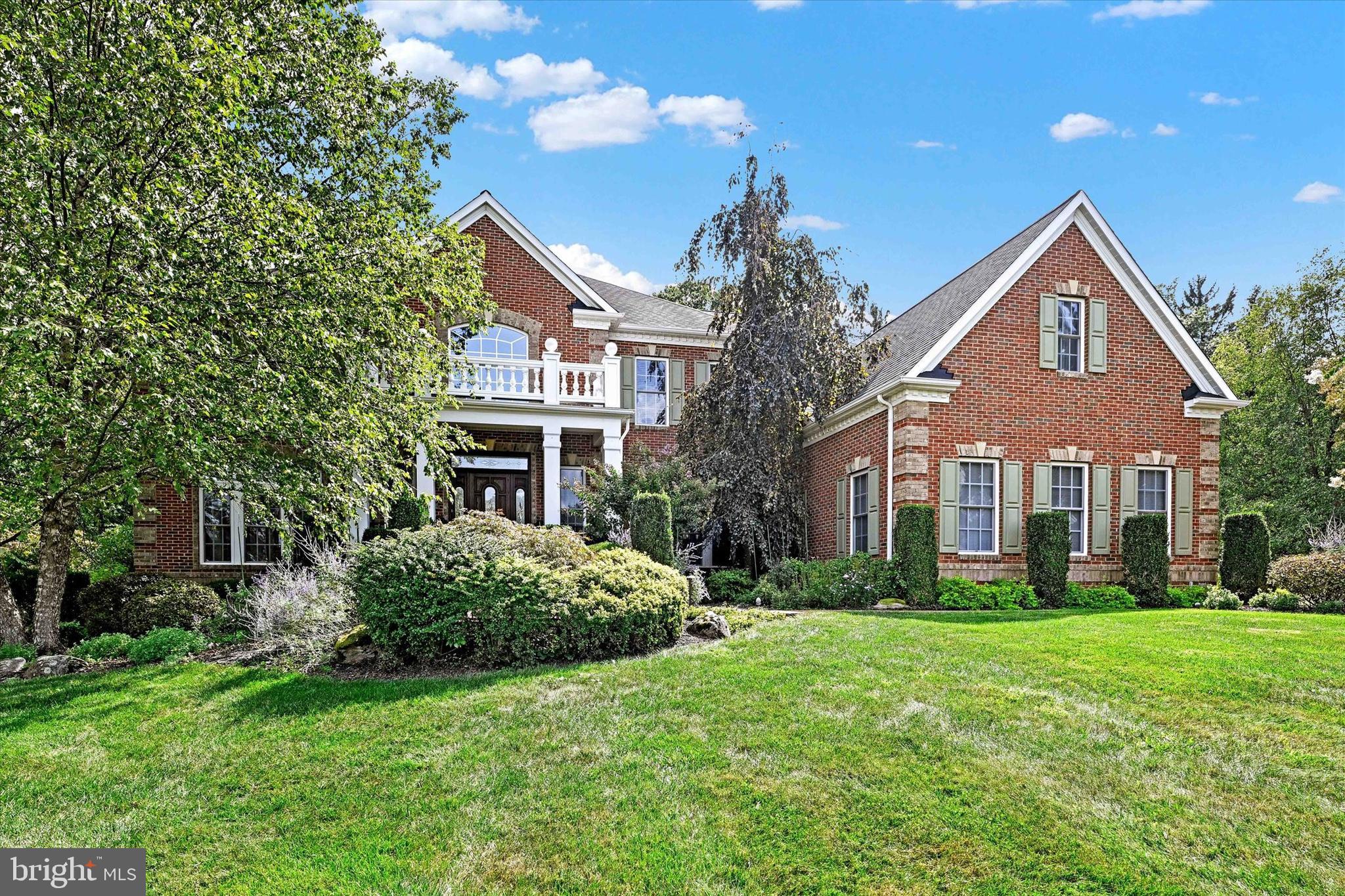 Stately brick 5-bedroom 6 baths colonial by NV Builders situated on a private 1.5-acre lot, tucked away in a cul-de-sac. A dramatic two-story foyer with sweeping dual staircases and an upper-level balcony overlook creates a striking first impression and sets the tone for the home’s grand scale and timeless architectural detail.
Sun-filled living spaces, refined millwork, and thoughtfully designed entertaining areas flow throughout the home. The primary suite offers a luxurious retreat with a spa-inspired bath featuring heated floors. Each additional bedroom includes an ensuite bath and walk-in closet, providing exceptional comfort and privacy for family and guests.
The fully finished lower level is designed for entertaining, featuring a spacious recreation area with fireplace, custom bar, billiards area, and additional lounge space ideal for gatherings or game nights.
Outdoor living is equally inviting with a spacious deck and patio overlooking the expansive grounds, all set within a quiet resort-like setting that offers both privacy and elegance.
Additional highlights include plantation shutters, custom window treatments, central vacuum, whole-house intercom and speaker system, standby generator, water treatment system, and dawn to dusk external fixture and landscape lights. MUST SEE!
