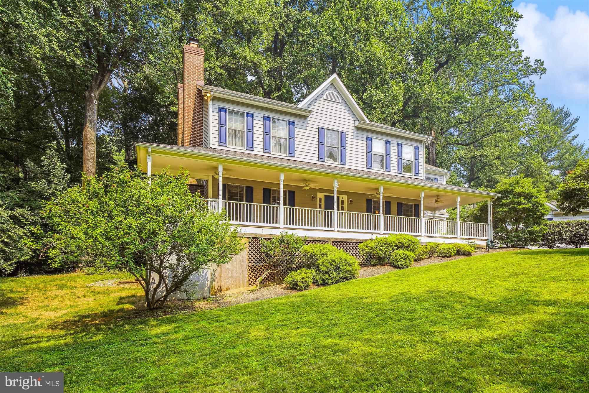 ****Major Price Adjustment****
Welcome to 4109 Jones Bridge Road, a beautiful Victorian Colonial  in sought after Chevy Chase. Nestled in lush woods, this hidden gem has 5 bedrooms, 4 full baths, and 1 half bath. With over 3700 sq ft this home has all the space you need to live, relax and make lasting memories. The large wrap-around porch leads you to the front door of this stately home. On the main level you will find a separate dining room which leads to an open, eat-in gourmet kitchen with breakfast bar and center island. The kitchen features three sinks,  a Thermador cooktop and double oven,  Jenn-Air refrigerator, Bosch dishwasher and wine refrigerator. This is the perfect place to exercise your culinary skills. Adjacent to the kitchen is a comfortable family room with fireplace and built in bookcase. The formal living room with a separate fireplace is perfect place to relax and decompress. Enjoy the great outdoors on the spacious rear deck that overlooks a tranquil wooded landscape. The laundry room is also located on the main level adjacent the kitchen.

The upper level has 4 bedrooms and 3 full baths. The primary bedroom is very spacious with a large walk-in closet. The primary bathroom is very large with a double vanity, soaking bathtub with jets and separate large shower. The 2nd bedroom is also a spacious en-suite with a walk-in closet and private bathroom, also with a jetted bathtub and separate tiled shower. The 3rd and 4th bedroom are light-filled and roomy. 

 The lower level features a large recreation area with a third fireplace, that provides a great space to entertain and relax. The lower level also has an ample bedroom with a full bath. 
The home has crown molding,  hardwood floors and high-ceilings throughout. The property also features a detached two-car garage and a lovely lower-level patio.

Recent updates and improvements include: Roof (2021), Covered wrap around (roof, floor, railing-2021), Exterior shed (2021), Hardwood flooring upstairs (2018), Washer (2019), AC/Heating unit (2020), Exterior of the home repainted and resealed in 2021  the  in 2021, Oil tank heat motor (2019), Oil tank serviced (April 2023-on service plan), Rear deck repaired and refinished (2021), Repaved driveway (2022), Surrounding trees assessed by the city and cut down as needed (2022), New GFCI outlets (2023), Gas fireplace serviced and cleaned (2021)

Less than 3 miles from Washington D.C., this peri-urban oasis is tucked away in nature and still convenient to all Chevy Chase and Bethesda have to offer: fabulous restaurants, boutiques, grocery stores, NIH, Navy Medical/Walter Reed, Metro, Capital Beltway and so much more.