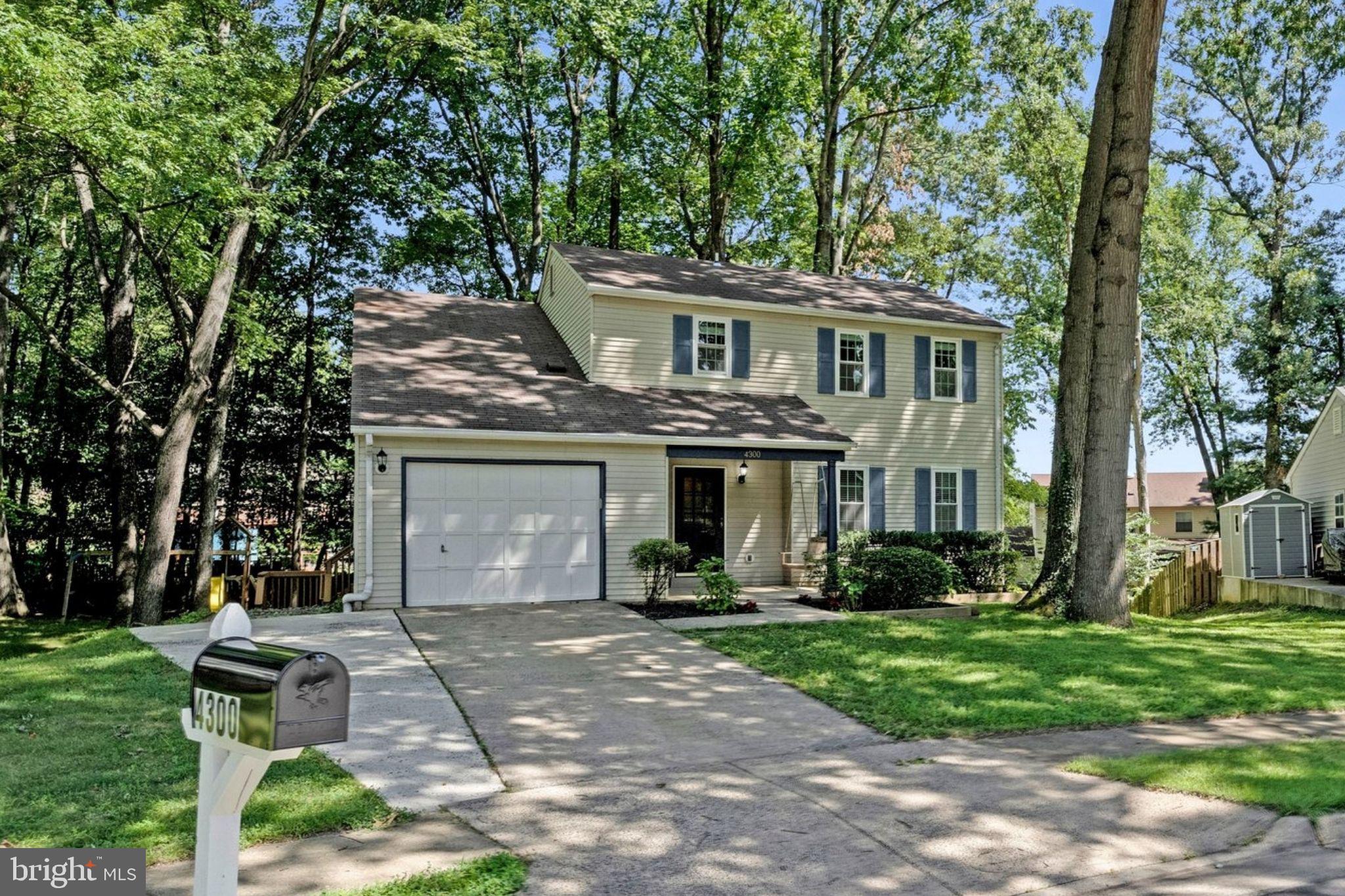 Welcome to 4300 Tartan Oak Ct, a well-maintained Colonial tucked away on a quiet cul-de-sac in the sought-after Chestnut Hills West community. Offering 4 beds, 2.5 baths, a 1-car attached garage, convenient layout, and timeless curb appeal. The welcoming front porch comes with a porch swing and is a charming entrance to the home. The hardwood floors on the main level, new carpeting on the upper and lower levels (2026), spacious living and dining areas, an inviting family room, and an updated kitchen with center island and breakfast area create the perfect balance of style and functionality. The expansive, private backyard offers mature trees with plenty of room for gardening. Be sure to enjoy the outdoors on the oversized rear deck, freshly stained (2026), perfect for entertaining - just break out the grill and a cooler!  All of the home’s bedrooms are found on the upper level including the primary bedroom suite. The primary bedroom suite offers a primary ensuite bathroom and large walk-in closet with built-in closet system. The other 3 bedrooms are all generously sized, offer ample storage space, and share the hall full bathroom. The finished, walk-out lower level boasts a large recreation room perfect for a home office, gym, or home theater, and large laundry and utilities room. Notable updates: hot water heater (2026), epoxied garage floor (2026), freshly painted throughout (2026) dishwasher (2025), gutters & gutter screens (2024), front porch concrete (2024), refrigerator (2023), microwave (2023). Perfectly positioned in the desirable Woodson/Frost/Olde Creek pyramid - this home combines a peaceful neighborhood setting just outside the Beltway with exceptional convenience. Just minutes away, you'll find the vibrant restaurants, boutiques, and community events of Old Town Fairfax alongside local movie theaters and parks. Commuters will appreciate the central location with easy access to major commuter routes (123, I-495, I-66, 50, Braddock Road, Fairfax County Parkway) along with being less than 5 miles to the Vienna/Fairfax GMU Metro, making travel throughout DMV convenient.