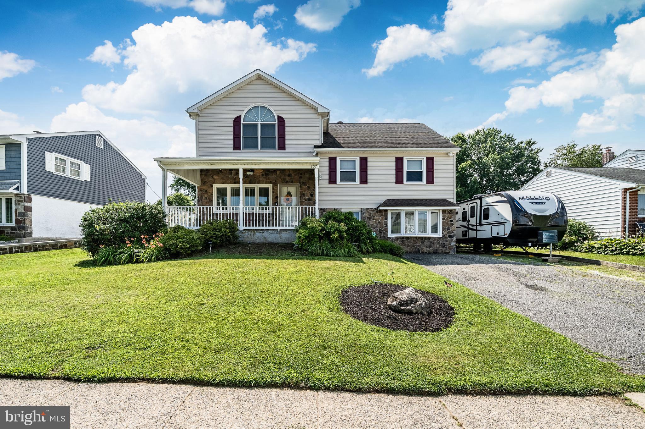 Not your typical Lawrence Park home!  This spacious six bedroom residence sits on an enormous, level lot and offers exceptional living space, a detached two-car garage and a finished basement making it an ideal choice for a large or multi-generational family.
The main level features a living room, formal dining room and kitchen with access to a covered porch. The next level offers three bedrooms and a full hall bath.
The upper level is dedicated to the primary suite, complete with cathedral ceilings, an en-suite bath, and access to a walk-up attic.  Also on this level is an additional room that could serve as a bedroom, fitness room, sitting area, or private living space dedicated to the bedroom with full bath that is steps below.  This additional bedroom also leads directly into the kitchen and would make an ideal in-laws quarters.
The lower level has been expanded and includes a spacious recreation room with a gas fireplace, a laundry room, powder room and a game room with access to the backyard.  One more level down is another finished space.
Outside the expansive  backyard is ready for everything from Sunday football games to the pool you've always dreamed of.
The versatile floor plan offers endless possibilities to accommodate your family's unique lifestyle and changing needs.
Conveniently located within walking distance of the elementary school, shopping center and veterans park.