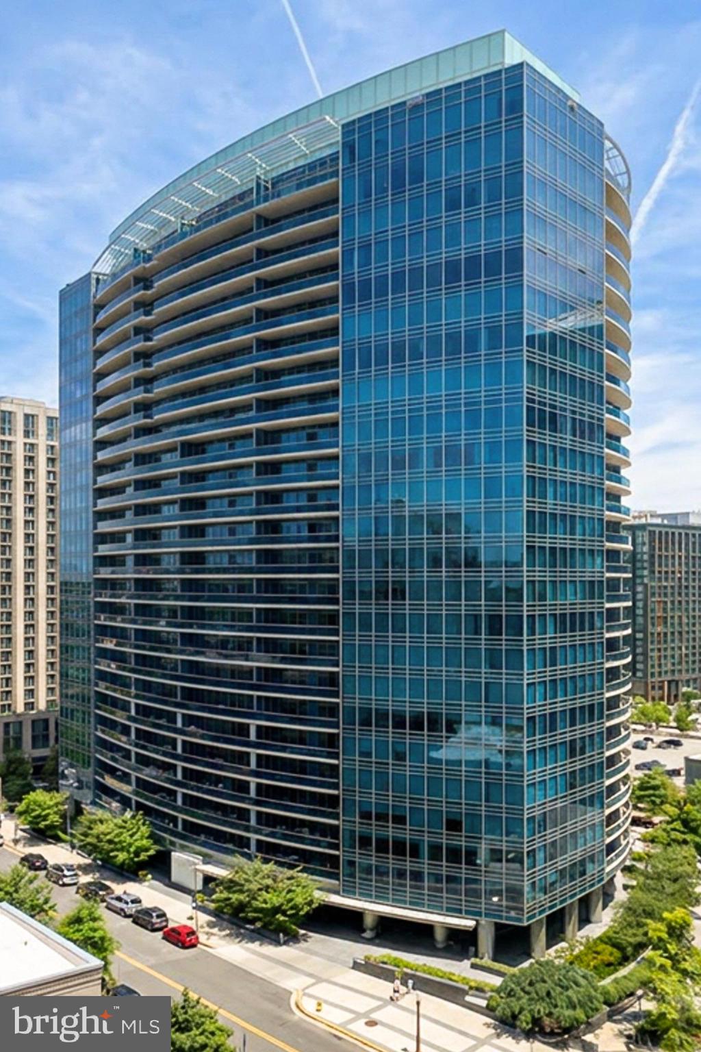 As you step inside Unit 511 from your private elevator and entrance, you’ll immediately understand why Turnberry Tower is widely considered the crown jewel of Rosslyn living. This isn’t just a residence; it’s a sanctuary where luxury is woven into every square inch.

The magic begins at first light. Positioned to capture the morning’s early glow, the expansive 240-square-foot private balcony offers a front-row seat to spectacular sunrise vistas. This outdoor oasis flows seamlessly from the interior, including the efficiently designed gourmet kitchen. A true chef’s dream, the kitchen is crafted to maximize flow and function without sacrificing an ounce of style. Whether you’re prepping a multi-course meal or brewing your morning espresso, it is the ultimate way to start your day: watching the city wake up from your own elevated vantage point as light pours through massive floor-to-ceiling windows.

The living quarters are equally impressive, led by a luxurious primary bedroom suite that features its own direct access to the balcony. The home also offers an elegant second bedroom and a versatile third room that can easily adapt to your lifestyle as a guest suite, a cozy den, or a sophisticated home office. For ultimate convenience, the residence includes a dedicated, separate in-unit laundry room.

The lifestyle here extends far beyond your front door. Living at Turnberry Tower means enjoying a seamless existence managed by a world-class team. From the 24-hour concierge and valet to the exceptionally capable on-site management, the service here is attentive, discreet, and truly white-glove. The amenities are equally world-class, featuring a sprawling fitness center and an indoor pool that rivals the most exclusive social clubs.

Located in the heart of Rosslyn, you’re perfectly positioned for the best of both worlds. It’s rare to find a home that offers this level of sophistication alongside such a dedicated staff and an unbeatable location.