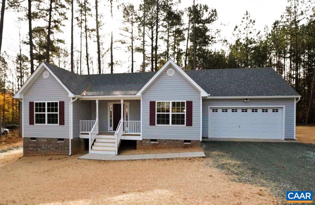 PRESOLD Marie Model within walking distance to the Turkey Sag Gate where you will enjoy restaurants and shopping at Lake Monticello.  Upgrades include Rear Steps from the backdoor to enjoy the backyard. Stainless steel appliances, 5' shower with glass doors and elongated toilets in both bathrooms, custom size doors in the master bedroom and bathroom, and lot premium.,Formica Counter,Wood Cabinets