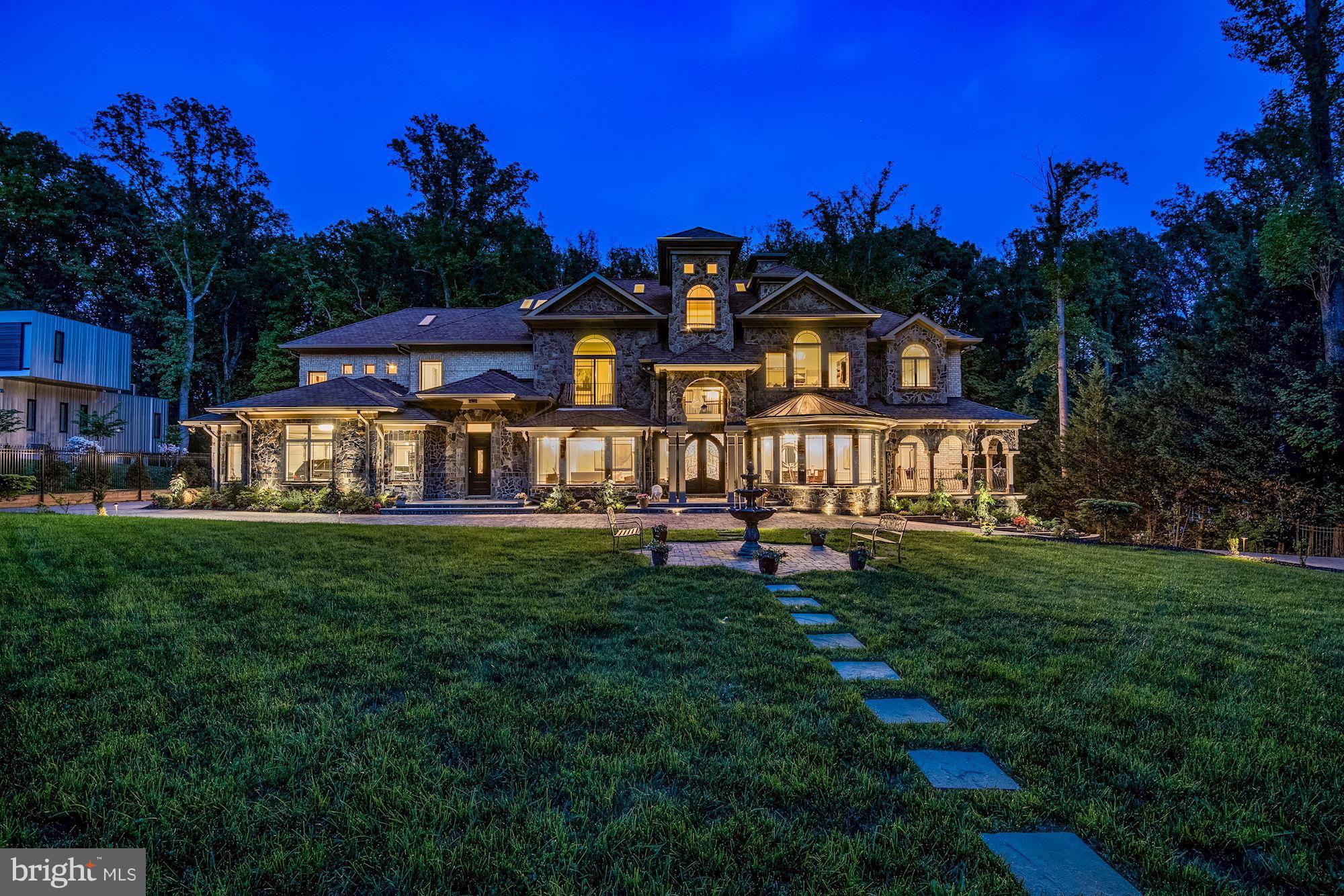 Best value in McLean, priced well below cost. Ins. replacement cost $4,800,000 excluding land value. New construction fully finished 14,800+/- Sf of Finest Finishes Grandest Proportions. Close to Washington DC/Tysons/495/Metro exquisite magnificent estate boasts beautiful design and detail throughout. Elegantly Gracious Principal Rooms. Architect impeccable design, Entertain Hundreds! 3 Level Terraces. 8 Bedrooms, 9 Full + 3 Half Baths, 6-Car heated garages. Theater, Exercise Rm, 2 gourmet chefs Kitchens w/ Thermador appliances, 2 Laundry, Ref. Bar, Indoor Pool + 2 Showers/Bath, 2 front Entries, U-Shape permeable paver 20  Driveway, Private Large lot backing to Wooded backyard overlooking a spectacular terraces to natural waterfall. Smart/app Irrigation system. Top quality finishes unparallel workmanship. 3 story foyer w/ 14  Egyptian crystal chandlers, Carrara marble in Entry and master bath w/her dressing room, 2 entries, 2 family rooms, rough in emergency generator & 4 stops elevator. sculptured curved staircases craftly nestled weaving the house interior unifying its majestic richness bringing together timeless elegance with full attention to design and intricate details. 3 years of master architect planning, design and masterpiece exquisite craftsmanship. Stately Resting majestically behind lush landscaping nestled in to wrought-iron gates. Lowest taxes considering house size and what it has to offer.