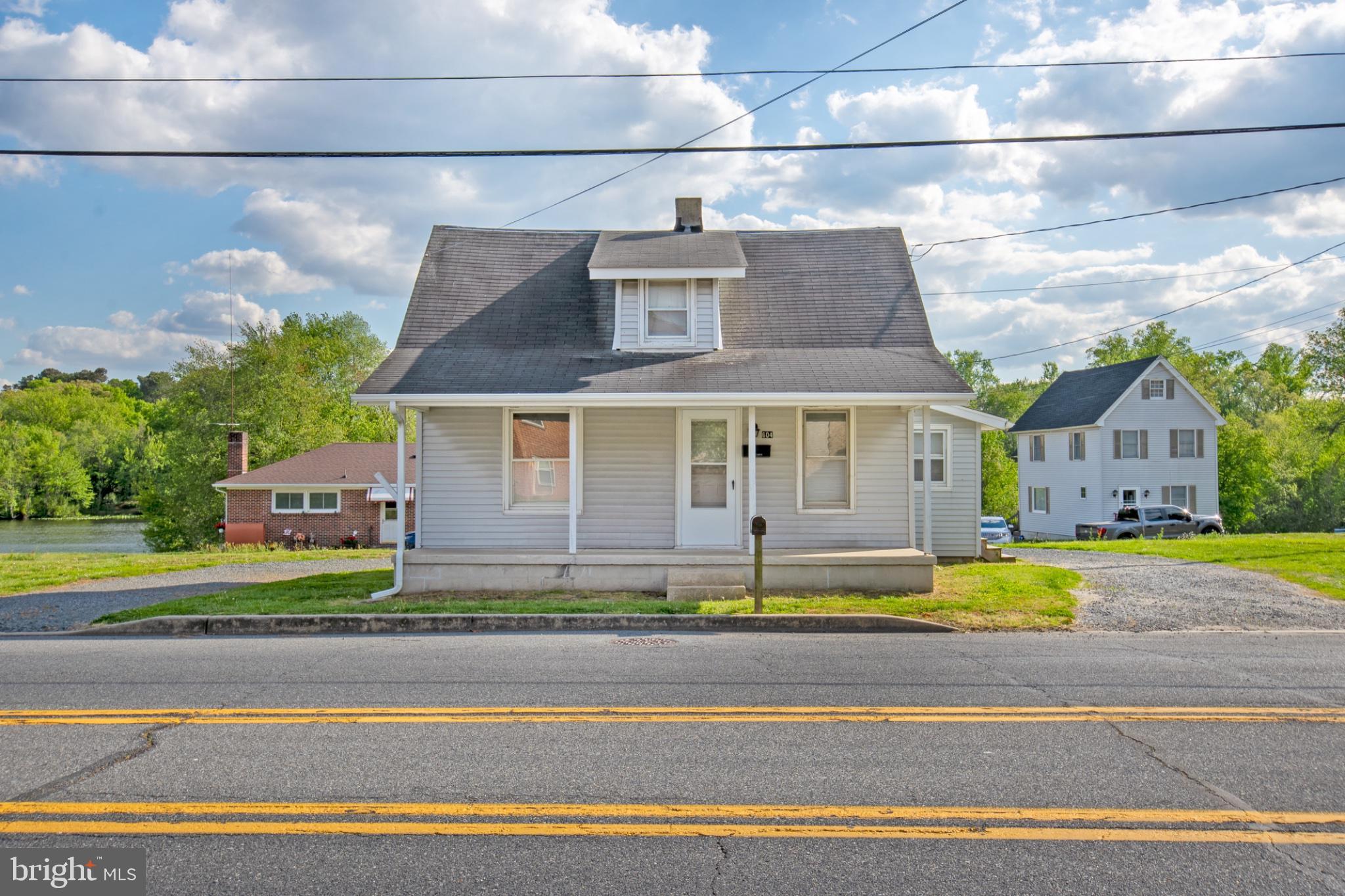 Welcome to 604 NW Front Street in Milford, Delaware — a charming home full of character, history, and scenic surroundings. Lovingly owned and maintained by the same family for decades, this recently renovated property blends timeless charm with thoughtful updates. Enjoy partial water views from Milford's Silver Lake.

Inside, you’ll find a mix of original wood details and classic paneling that add warmth and personality throughout the home, paired with Professionally Installed brand-new luxury vinyl plank flooring for a fresh, modern touch. Recent improvements provide move-in-ready convenience, and a brand-new roof is scheduled to be installed this month for added peace of mind. 

Relax on the covered front porch, walk to the local shops near by, or enjoy the spacious lot with ample parking. Whether you’re searching for a primary residence, investment opportunity, or a home with small-town charm and unique character, this Milford property offers endless potential in a convenient location close to downtown shopping, dining, and local amenities.