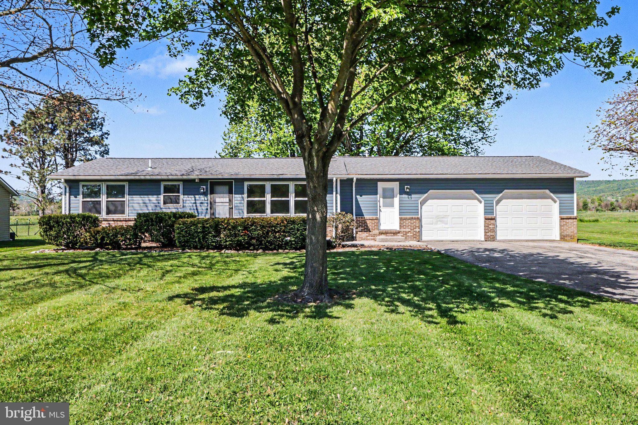 Remodeled 3-bedroom, 2-bath rancher located in Fairfield, PA. This home features a new roof, new siding, and a updated interior with new LVP flooring and fresh neutral paint throughout. The kitchen has been completely renovated with white cabinetry, quartz countertops, stainless steel appliances, farm sink and a gas stove. Washer and dryer are approximately one year old.
A spacious rear family room offers expansive views of mountains, fields, and sunsets. The property includes a level, nicely landscaped lot, an attached 2-car garage, and ample driveway parking. Public water and sewer. Conveniently located within walking distance to the post office and mini‑mart. This home is move‑in ready and priced to sell.