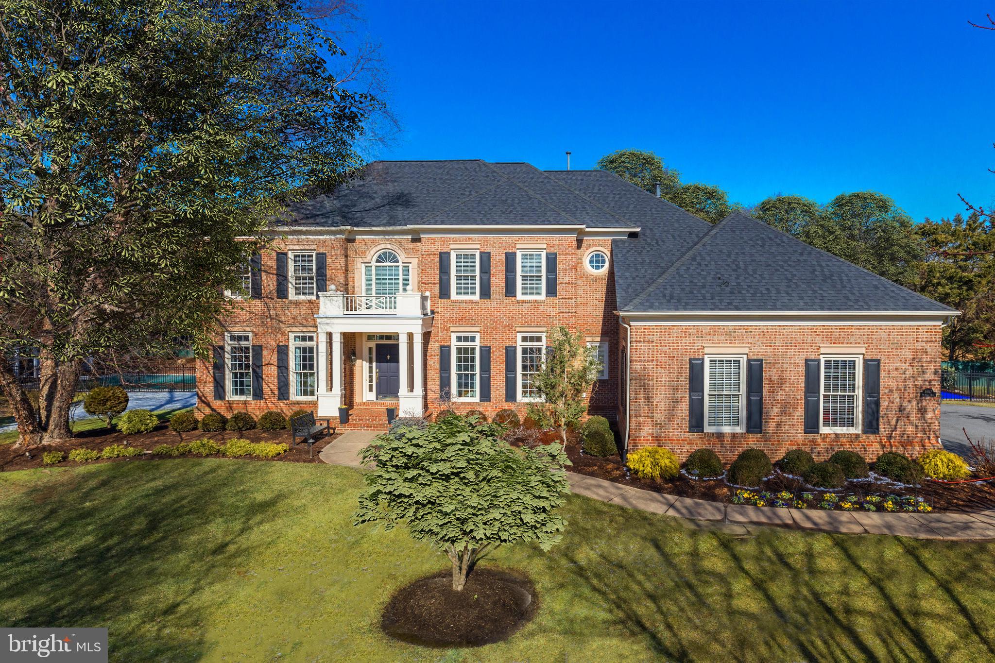 ***ACCEPTED CONTRACT *****Handsome All Brick Colonial with pool, sport court and screened porch * Updated throughout with top of the line materials and designer touches * Sited on a Cul De Sac * Dedicated Home Office on Main Level with a wall of built-ins * Open floor plan offers great flow for entertaining * 5,300 sf of living on three levels with generous room sizes and large windows offering loads of natural light * Top of the line kitchen with large picture window, quartz countertops and stainless steel Jenn Air appliances and cozy reading / sitting niche  * Family Room with wood burning fireplace with handsome custom mantle * Breakfast nook with triple sliding glass doors to deck * Wainscoted walls in Foyer, Dining Room and Library * Hardwoods throughout main and upper levels * Primary Suite with 9' Tray Ceiling, Sitting Room & Gas Fireplace, Luxury Spa Like Bathroom and Huge Walk-In Closet.  * Nine foot ceilings on main & lower levels  * Walk-up lower level with large Rec Room, Bedroom & Full Bath and huge unfinished storage area with room that could be future media or exercise room * Outdoor Living  at its finest with New Trex Deck & Screened-Porch with Cathedral ceiling with Skylights,  expansive Patio and built-In Fire Pit * McLean One Hundred has a central park and is a great walking neighborhood *  Walk or Bike to Spring Hill Recreation Center and Sports Fields * Great proximity to Tysons, the Silver Line Metro and easy access to major commuter routes into Washington DC, the Dulles/Reston Technology Corridor
