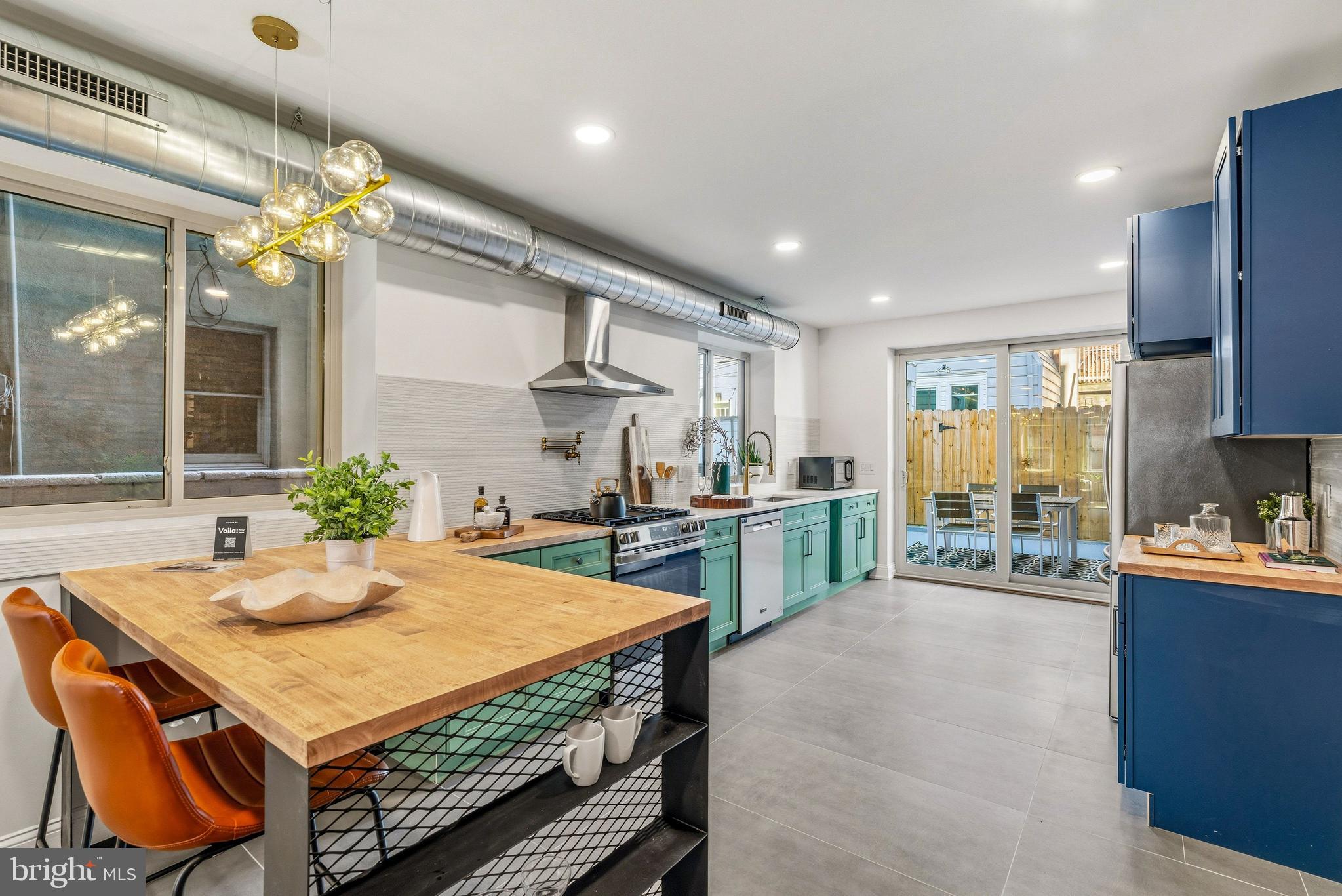 10 Year Tax Abatement! Stunning South Philly Passyunk Home with Breathtaking Rooftop Views, and Outdoor Kitchen. This meticulously renovated property, offers the perfect blend of modern luxury and sophisticated design. With 4 spacious bedrooms, 4.5 elegantly appointed bathrooms, and a host of premium features, this home is a true gem in one of Philadelphia's most desirable neighborhoods. Key Features Include, Elegant Bedrooms: Four generously sized bedrooms, each equipped with its own ensuite bathroom, offer comfort and privacy for both family members and guests. Every room embodies the luxury of a primary suite, serving as a true retreat with spa-like bathrooms. Opulent Living Space: Spanning multiple levels, this home boasts an expansive layout that provides plenty of room for entertaining and relaxation. The open-concept living and dining areas are perfect for hosting gatherings or enjoying quiet family moments. Gourmet Kitchen: The heart of this home is its state-of-the-art kitchen, equipped with top-of-the-line appliances, featuring a double refrigerator,  quartz countertops, and custom multi-tone cabinetry. Whether you're a culinary enthusiast or simply enjoy cooking at home, this kitchen will inspire your inner chef.  Complete renovation including: New Roof, New Okna 3-Panel Windows, Premium Insulation R-60 and Thermal insulation between Floors and Party Walls. Dual Zone, Two Separate New HVAC Systems and More! Finished Basement: The fully finished basement offers versatility for a utility space, home office, gym, or entertainment room. Customize this space to suit your lifestyle needs. Rooftop Oasis: The standout feature of this property is the stunning rooftop terrace, offering panoramic views of the Philadelphia stadiums and city skyline. It's the perfect spot for unwinding after a long day or hosting unforgettable gatherings under the stars.  Prime Location: Situated in the vibrant neighborhood with ideal walkability, you'll enjoy easy access to trendy shops, award-winning restaurants, and lively community events. Experience the best of Philadelphia living right at your doorstep. This home embodies a lifestyle of luxury and convenience, making it an exceptional opportunity for todays savvy buyers. Don't miss the chance to make this exquisite property your own. Schedule a viewing today and step into a world of elegance and comfort!
