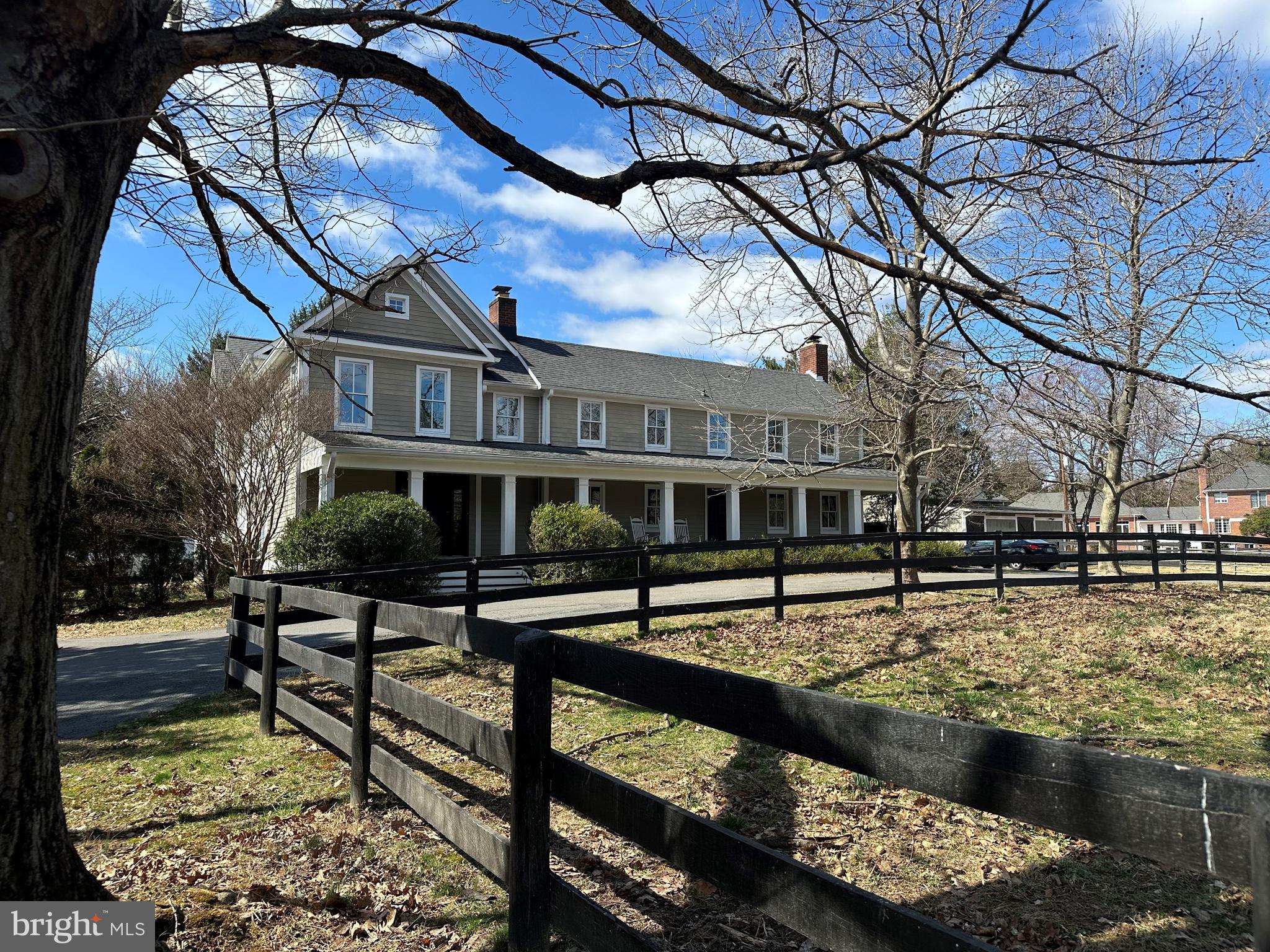 Welcome to this one-of-a-kind property that blends Civil War era history with the modern amenities for today's lifestyle.  The original section was built in the 1820s and was the home to the Walker family, for whom the Great Falls road is named.  The original home, to which several additions have been made over two centuries, is now incorporated into the current residence, and the newest addition was built in 2005.  The oldest section includes original random width heart of pine flooring, hand-hewn beams, and fireplaces with local stone.  The addition provides a true farm house front porch, spacious foyer, lovely staircase, large family room, modern kitchen, owner's suite, and wide balcony that overlooks the nearby scenic pond, which was originally a large farm pond that watered the cows in the area.  In addition, there is a 3-stall barn with tack room and hay loft, and four paddocks on two acres.  This historic home and equestrian property is only one mile to the village center and two blocks to River Bend Country Club.  This is a special opportunity to enjoy a rural and historic ambience among a suburban and neighborly setting.  It is truly a rare home that boasts character and charm, yet convenience, that is often missing in today's residential offerings.