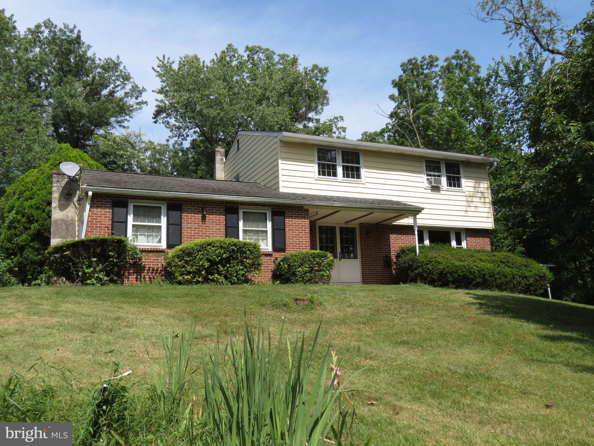 Nestled on 3.6 scenic acres and set back from the road, this charming four bedroom colonial offers privacy, space ande endless potential.  Priced well below the value of comparable homess in the area, this is a rare opportunity for buyers looking to build equity and create their dream home.  Inside, you will find solid bones, hardwood floors throughout, a spacious formal living room, formal dining room an updated eat-in-kitchen featuring a beautiful bay window and a large family room with stone wood burning fireplace.  Four nice sized bedrooms upstairs with full hall bathroom.  The home offers a convenient powder room on first floor off main hallway, full upstairs bath, unfinished basement and 1 car attached garage.  Outside is where the magic happens with a quaint koi pond and plenty of room to garden, relax or entertain. While the home is in need of cosmetic updates and repairs, it offers an exceptional foundation for someone with vision and creativity.  This property is ready for it's next chapter.  Property is being sold as-is.