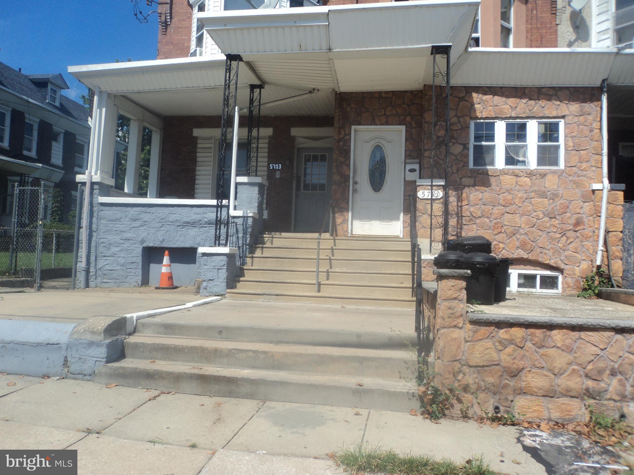 Large, first floor apartment- Concrete open porch- Oversized living room- Large dinning  room- Eat-in kitchen with ceramic tile flooring, refrigerator, dishwasher, new four burner gas range, microwave, ceramic tile backsplash, stone top working areas, overhead and base cabinets. Laundry area with washer and dryer. Two large bedrooms with ample closet space . New wooden flooring in the living room, dinning room, and 2 bedrooms. Ceramic tile hall bath with new vanity sink. Large, fenced rear yard.