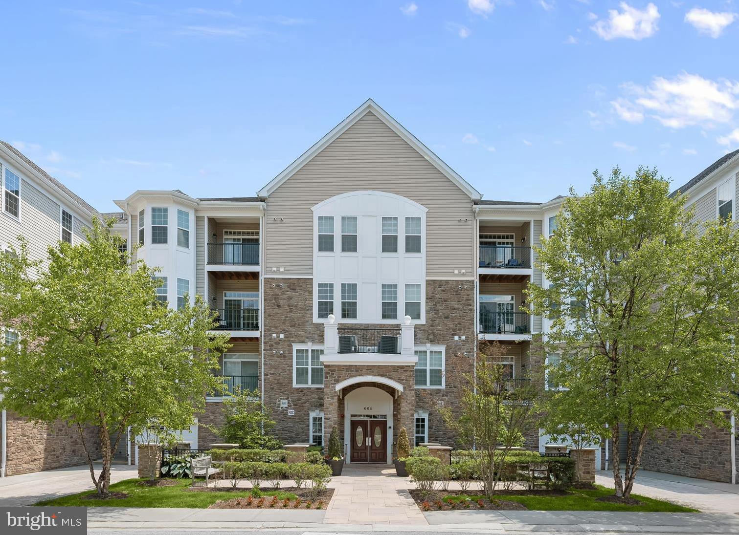 This charming contemporary condo, built in 2018, offers a perfect blend of comfort and modern living. With 1,463 sq. ft. of thoughtfully designed space, it features two spacious bedrooms and two full bathrooms, ideal for relaxation and privacy. The heart of the home is the inviting kitchen, equipped with essential appliances including a refrigerator with icemaker, dishwasher, microwave, and stove, making meal prep a delight. Enjoy the convenience of an in-unit washer and dryer, ensuring laundry days are a breeze. Step outside to discover community amenities like a refreshing swimming pool, scenic jog/walk paths, and a welcoming community center, perfect for social gatherings. The detached garage provides secure parking and extra storage. With snow removal and trash services included in the association fee, maintenance is hassle-free. Experience the warmth and comfort of this lovely home, where every detail is designed for your convenience and enjoyment.