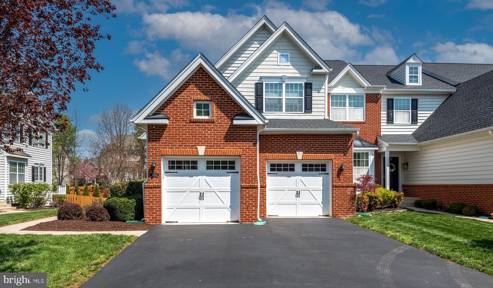Best Value in the Coveted Dominion Valley Country Club! Perfectly maintained by its original owner, this end-unit townhome with a 2-car garage lives like a single-family retreat. Boasting approximately 3,200 sq ft across three beautifully finished levels, this 3-bedroom, 3.5-bath home offers comfort, space, and style. Step into an open-concept floor plan featuring stunning maple wood floors throughout the main level. The formal living room impresses with a two-story vaulted ceiling and skylight, while the separate dining room showcases elegant crown molding. The spacious kitchen is flooded with natural light through a Palladian window and includes granite countertops, stainless steel appliances, and a cozy breakfast nook. Step outside onto the maintenance-free deck—perfect for morning coffee or evening relaxation. Upstairs, the large owner’s suite features a cathedral ceiling, walk-in closet, and a luxurious en-suite bath with upgraded ceramic tile, a soaking tub, and separate shower. The finished basement includes a full bath, a generous rec room with egress window, and tons of storage space—ideal for entertaining or relaxing. Additional features include: Upgraded light fixtures throughout, Premium lot backing to trees for added privacy, Roof replaced in 2017, Water heater replaced in 2020, Abundant guest parking. Great location: a short walk to Gravely Elementary and the Waverly Club (featuring both indoor and outdoor pools). Enjoy world-class community amenities including the Arnold Palmer Signature Golf Course, a renovated clubhouse, state-of-the-art Sports Pavilion, five pools, tennis and basketball courts, playgrounds, miles of walking/biking trails, and two scenic fishing ponds. Award winning schools!