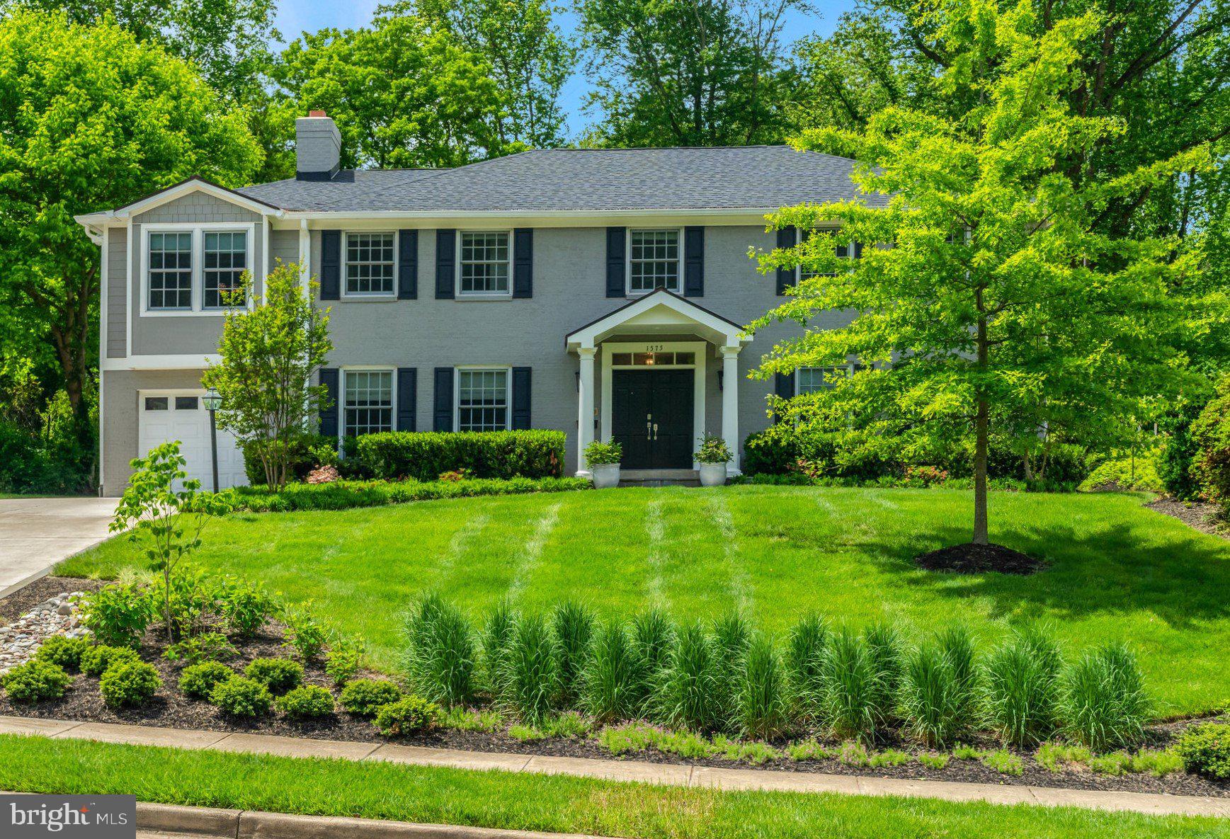 Nestled within the highly sought after Forest Villa neighborhood with close proximity to DC, downtown McLean, the vibrant Tysons hub, and points beyond, this expanded and beautifully renovated 5 Bedroom, 4.5 Bathroom 3-level Colonial is sited on a sprawling .62-acre parcel and offers over 4300sf of meticulously curated living space. 

The gourmet Kitchen with white cabinetry, marble countertops, center island, and 6-burner+griddle GE Monogram range is a culinary haven for creating your favorite meals, entertaining guests, and gathering with family.  Enjoy relaxed dining in the Breakfast area addition, or step outside to the expansive flagstone patio to bar-b-que your favorites, enjoy morning coffee, or host your next soiree this summer.  

The backyard will take your breath away as you frolic in the massive grassy yard and gaze at the wooded views beyond.  The relaxing Family Room has a wood-burning Fireplace and custom wainscotting. The large Dining Room features custom wainscotting and a designer chandelier and opens to the delightful and bright SunRoom overlooking the backyard.  The oversized Living Room accommodates both formal or informal use for family and friends. A Mudroom with Laundry station is accessed directly from the main level Garage, making it easy to carry in groceries, luggage, sports equipment, or anything else that needs to come inside.  The main level Powder Room is adorned with lovely floral wallpaper and a pedestal sink.  

Ascending to upper level, a sanctuary awaits you in the magnificent Primary Bedroom Suite addition (2018/2019) with 10’ vaulted ceilings, a sitting area overlooking the backyard, private Office with custom built-ins and desk, as well as a massive walk-in closet with custom closet system and windows for natural light.  The Primary Bathroom feels like a natural and calming spa with porcelain tile surround and floors, 2 vanities, free standing soaking tub, shower with honed pebble tile base, and linen closet.  An additional 4 large Bedrooms and 2 Full Bathrooms generously appointed with Restoration Hardware, Kholer fixtures, and marble tile complete the upper level.

The lower level has a large Rec Room with Full Bathroom and a dedicated space for a Home Gym equipped with floor-to-ceiling mirrors and TV hook up.  Two storage closets and a storage room provide abundant storage space.  Easily access the Garage via walk-up stairs. 

Step outside to the breathtaking backyard for day or evening gatherings, playing sports, gardening, relaxing, or to enjoy al fresco dining.  Extra driveway parking parallel to Garage.  Access the Pimmit Run trail head just up the street, or take the path to Linway Terrace Park or Downtown McLean.  Close to Highlands Swim & Tennis Club, Chesterbrook Swim & Tennis Club, Fairfax and Arlington County parks, the Chain Bridge, Arlington, and Tysons. Easy access to the GW Parkway, I-66, and I-495.  Close proximity to both Dulles and Reagan airports.  A must see!