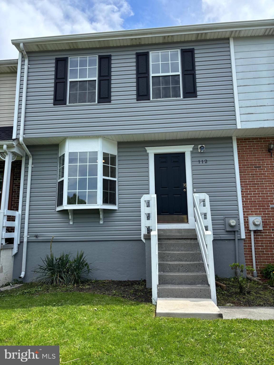 This almost fully renovated townhouse near Winchester offers 2 bedrooms and 2.5 bathrooms. The main level features vinyl plank flooring, a kitchen with new cabinets, countertops, appliances, and a bay window, as well as a half bathroom with a new vanity and toilet. The living room has access to a new deck. Upstairs, both spacious bedrooms have new carpet and their own full bathrooms with new vanities and flooring. The basement provides ample unfinished storage space with rough-ins for a future bathroom and a walkout to the seeded and strawed, partially fenced backyard.