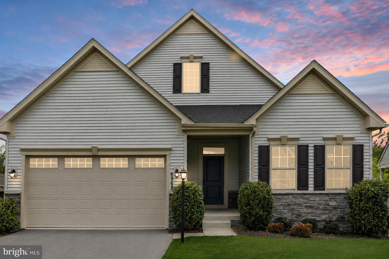 Rare opportunity for main-level living in the highly sought-after Lake Linganore community! This practically new Ryan Homes Palladio Ranch offers effortless one-level living with an expansive open floor plan and elevated finishes throughout.
Enjoy a private backyard with no homes behind you, backing to mature trees with beautiful seasonal views of Lake Merle. Whether you're sipping your morning coffee on the covered rear porch or unwinding at the end of the day, this peaceful setting offers the perfect blend of privacy and natural beauty.
The heart of the home is a gourmet kitchen designed to impress, featuring expansive countertop space, gas cooking, stainless steel appliances, double ovens, a large pantry, and seamless flow into the dining area and spacious living room. A stunning floor-to-ceiling stone fireplace creates a warm and inviting focal point, making the space ideal for both entertaining and everyday living.
The finished walkout basement provides exceptional flexibility with a spacious carpeted recreation area perfect for additional living space, a game room, home gym, or media room. The possibilities are endless. You'll also find a fourth bedroom, third full bath, and a generous storage area finished with luxury vinyl plank flooring.
As a resident of Lake Linganore, you'll enjoy resort-style amenities including private lakes, sandy beaches, multiple pools, scenic walking trails, playgrounds, pickleball and tennis courts, and year-round community events. Conveniently located just minutes from I-70, I-270, shopping, dining, and historic Downtown Frederick, this exceptional home offers the perfect combination of modern convenience, scenic surroundings, and the unmatched Lake Linganore lifestyle.