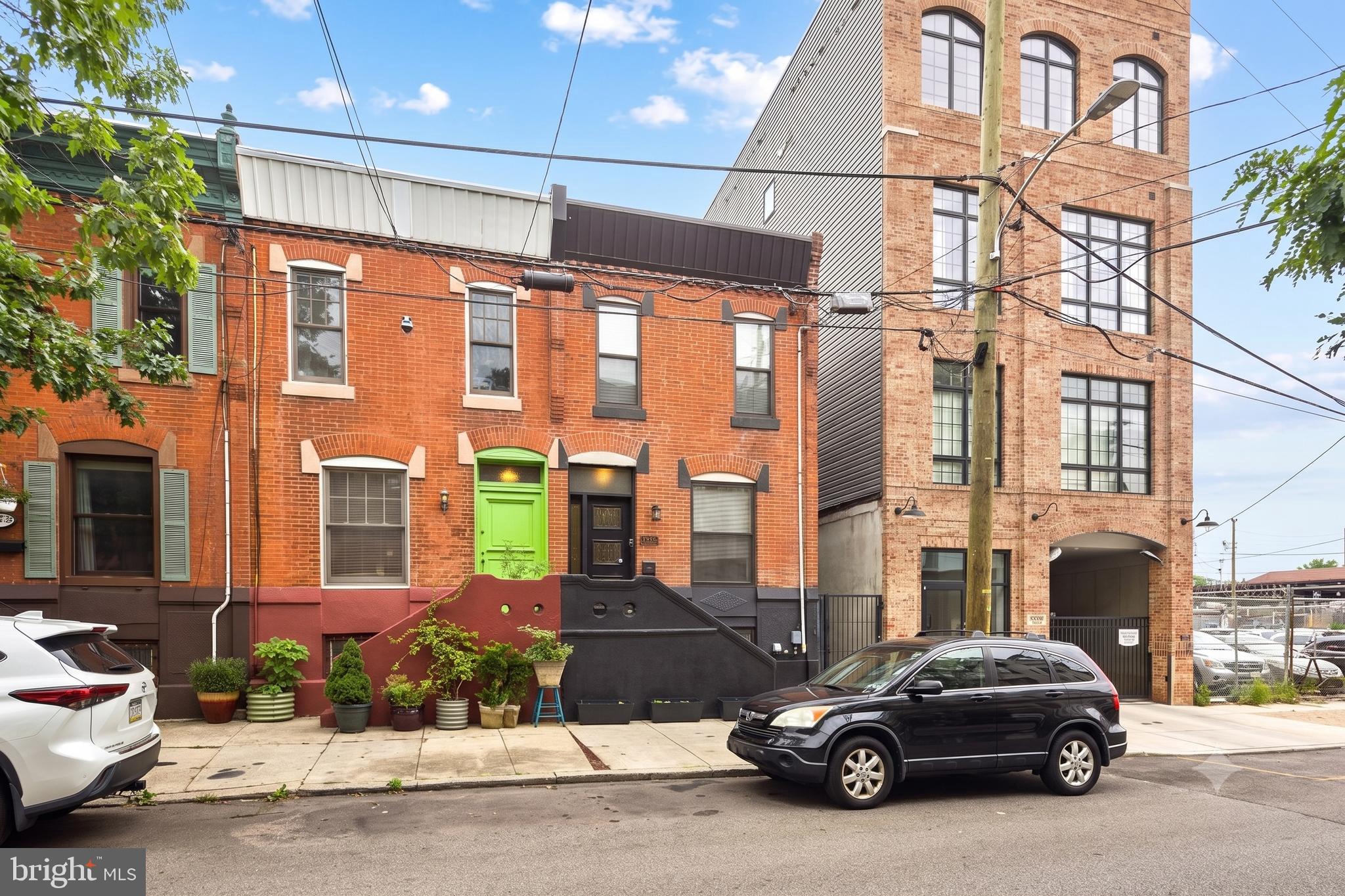 Welcome home to this meticulously renovated 3-bedroom, 2-full-bathroom townhome in one of Philadelphia's most sought-after neighborhoods, Graduate Hospital . Combining classic brick-front curb appeal with modern design, the main level greets you with a bright, wide-open floor plan featuring solid oak herringbone hardwood floors, high ceilings, and oversized black-trimmed windows. The fluid layout leaves plenty of room for both living and dining, flowing seamlessly into a chef-inspired kitchen with premium espresso cabinetry, granite countertops, and stainless steel appliances. A rare first-floor full bathroom with a custom glass shower enclosure — ideal for guests or flexible living — sits just off the kitchen, with direct access to a small outdoor area perfect for morning coffee or weekend grilling.
Upstairs, the second level hosts three bright bedrooms with impressive ceiling heights and ample closet space, alongside an expansive custom-tiled full bathroom. The fully finished basement adds durable plank tile flooring — perfect for a media den or home office — plus a dedicated laundry room. The house was renovated in 2019 and still has 3 years left on the tax abatement.   Please confirm details with the city.  
Situated in an unbeatable Graduate Hospital location, you're just blocks from Julian Abele Park, the South Street West corridor, and an effortless commute into Center City, University City, and the Schuylkill River Trail.