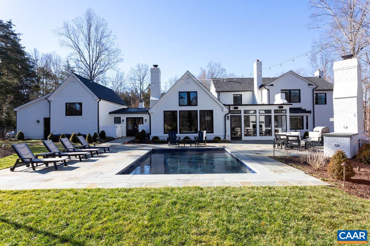 Situated in the heart of Farmington, 1505 Brook Hill Lane is a fully furnished residence that underwent a meticulous renovation, commencing in December 2019 and concluding with an additional phase in April 2023. The renovation involved a comprehensive down-to-the-studs overhaul, resulting in a thoughtfully updated home.  Inside, you'll find custom casework, a fully equipped home gym, and a versatile four-season room with a grilling kitchen. The rear yard has been designed for practical enjoyment, featuring an outdoor fireplace, a bluestone patio, and a heated/cooled "cocktail pool."  Priced $107,000 below a recent market appraisal of $5,357,000, 1505 Brook Hill Lane is located in one of Albemarle County's most desirable neighborhoods, embodying contemporary living in the sought-after Farmington community. This residence offers a blend of functionality and style, providing a comfortable and refined living space in an exclusive locale.