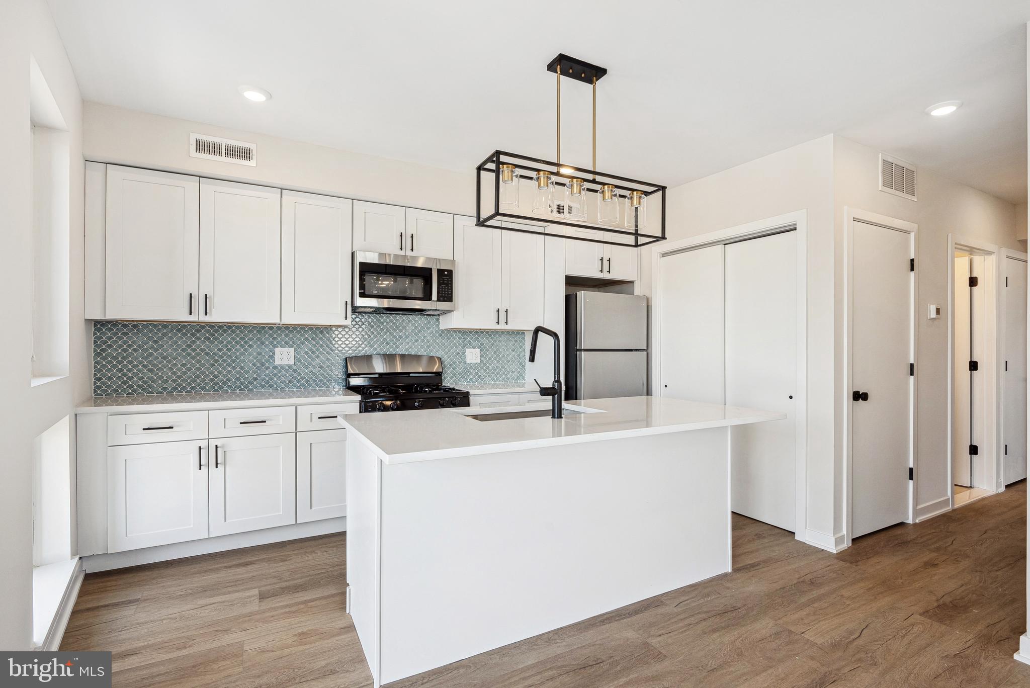 Welcome to 138 Tasker St, a brand-new construction building offering modern living at its finest. This beautifully designed unit features a spacious layout, hardwood floors, and high-end stainless steel appliances—including an in-unit washer/dryer, dishwasher, garbage disposal, microwave, and oven/stove. Enjoy sleek, contemporary bathrooms, and large windows throughout the unit that bring in abundant natural light, creating a warm and inviting atmosphere.  Private access to your own roof deck offers stunning views of the city, and plenty of space to enjoy warm summer nights. You are just steps from Dickinson Square Park and the Delaware River Waterfront, as well as tons of vibrant cafes and restaurants. Parking is available for just $150/month, a convenient price with I-95 just a few minutes drive away. Pets are welcome—cats with a one-time $350 non-refundable fee, and dogs with a $500 non-refundable fee (size and breed restrictions apply). Don’t miss the opportunity to live in one of Philly’s most desirable neighborhoods!