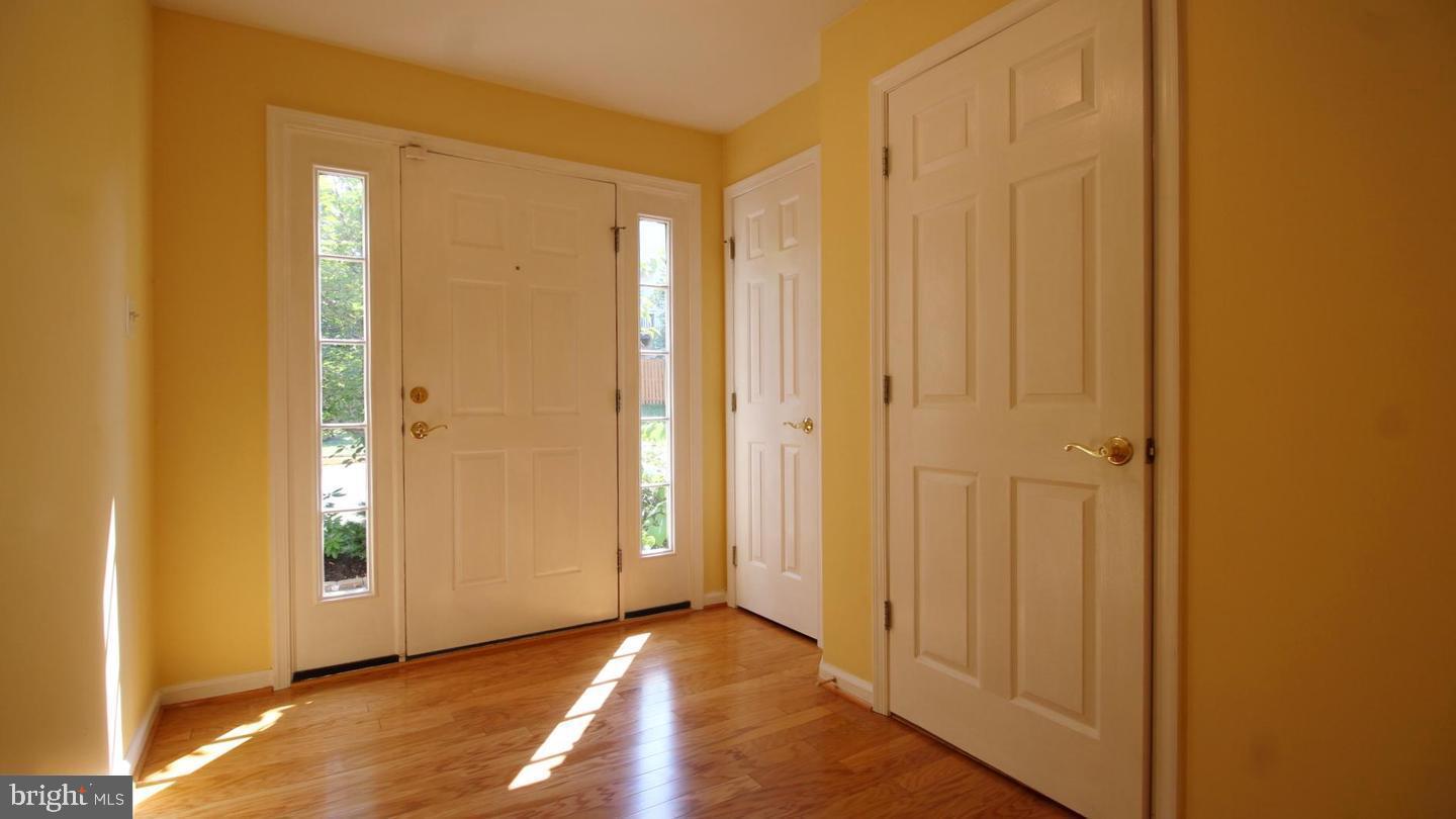 LOVELY light and bright classic colonial townhome in sought after Potomac Lakes!  This townhome is loaded with lovely features and 3 bedrooms/ 2 1/2 bathrooms, gleaming hardwood floors on all levels.  Beautiful living room with gas fireplace.  Gourmet cook's kitchen.   Sunroom off kitchen walks out to deck.  Master bedroom with walk-in closet, luxury bath.  Great commuter location: quick walk to commuter bus, 15 minute drive to Wiehle metro, close to route 7, One Loudoun, Cascades, and so much more!  A MUST SEE!