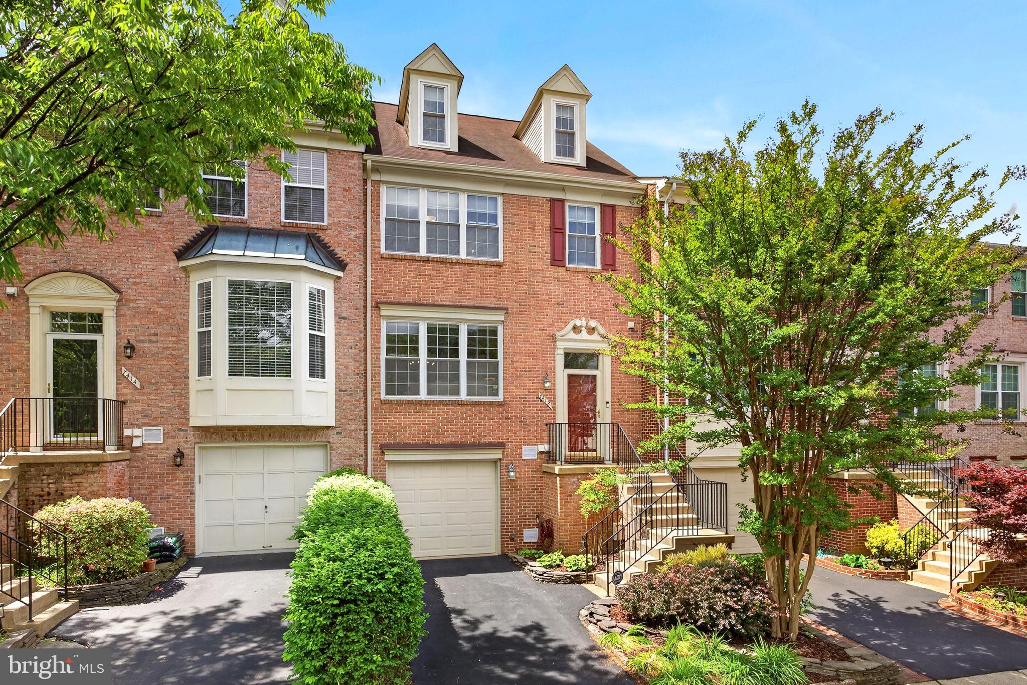 Welcome to 7412 Gillingham Row in Alexandra, VA 22315!
Rarely available 4 level Carr built Bedford model townhome with 1-car garage in the highly sought-after Kingstowne community! This immaculate brick-front home offers over 2,500 square feet of beautifully updated living space, blending timeless elegance, thoughtful upgrades, and an unbeatable location.
A grand foyer entry with soaring ceilings and transom window welcomes you inside, where hardwood flooring, crown molding, and abundant natural light set the tone throughout the main level. The expansive living room offers oversized windows and opens seamlessly to the formal dining room, creating an ideal layout for both entertaining and everyday living.

The beautifully updated kitchen features 42” cabinetry, granite countertops, stainless steel appliances, stylish backsplash, recessed lighting, and an oversized peninsula with abundant prep space and seating. A charming bay window fills the breakfast area with natural light, while the open-concept layout flows effortlessly into the adjoining family room complete with updated ceiling fan and sliding glass door access to the Trex deck. Enjoy peaceful wooded and common area views from the spacious outdoor living space, perfect for morning coffee, grilling, or evening gatherings. A beautifully updated powder room completes the main level.

Upstairs, hardwood flooring continues throughout. The expansive primary suite is a true retreat featuring vaulted ceilings, skylights, updated ceiling fan light, large walk-in closet, and a beautifully renovated spa-like bath with separate soaking tub and shower. The signature Bedford model loft on the 4th level, offers exceptional flexibility for a home office, gym, library, nursery, or private lounge space, along with an additional walk-in closet and generous storage.

Two additional upper-level bedrooms offer ceiling fan lighting, spacious closets, and share a beautifully renovated hall bath.

The deluxe walkout lower level features newer carpet, a cozy gas fireplace, powder room, and versatile recreation space ideal for movie nights, guests, gaming, or working from home. The lower-level powder room also offers future potential for conversion to a full bath.

Outdoor living continues with a lower patio and fenced yard, creating multiple spaces to relax and entertain.

Meticulously maintained and thoughtfully updated throughout, including energy-efficient windows and sliding glass doors with transferable warranty (2014), roof (2014/2015), garage door (2014), HVAC (2016), washer and dryer (2025), updated lighting and ceiling fans (2023-2026), stylish backsplash (2026), 

Perfectly tucked away on a quiet cul-de-sac, this exceptional home is just minutes to Metro, Van Dorn, I-495, shopping, dining, and all of Kingstowne’s sought-after amenities, including pools, fitness centers, tennis courts, walking trails, playgrounds, and beautifully maintained community spaces.

Location, lifestyle, and space come together beautifully in this exceptional Kingstowne home.

** This property qualifies for a special subsidized conforming 30-year fixed-rate loan program, offering an interest rate approximately 0.25% below standard Fannie Mae/Freddie Mac financing for eligible buyers. Program guidelines and restrictions apply. Additionally, the property recently received an appraisal waiver at a value exceeding the current list price. **