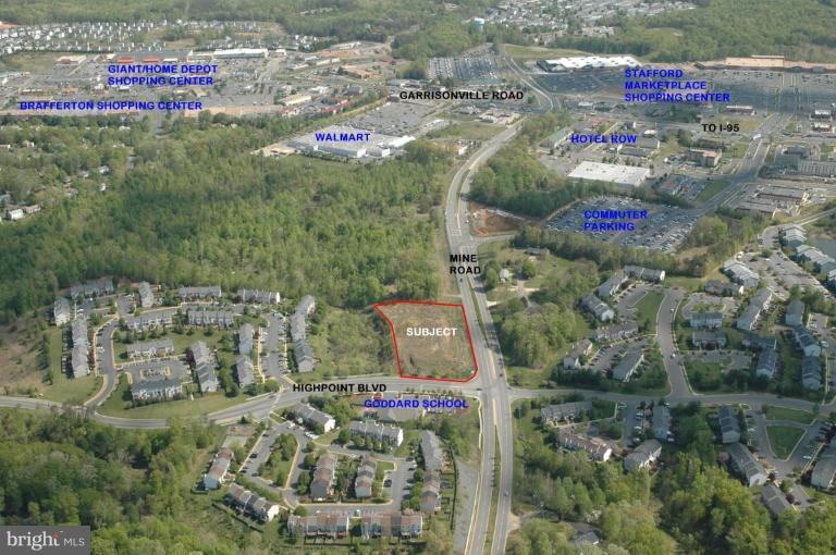 Corner property fronting an access point to strong residential subdivision areas, offsite stormwater provisions in place, public water & sewer available, proximate to walmart, commuter parking lot, hotels & goddard child care center on opposite corner. TAX MAP 20 123D