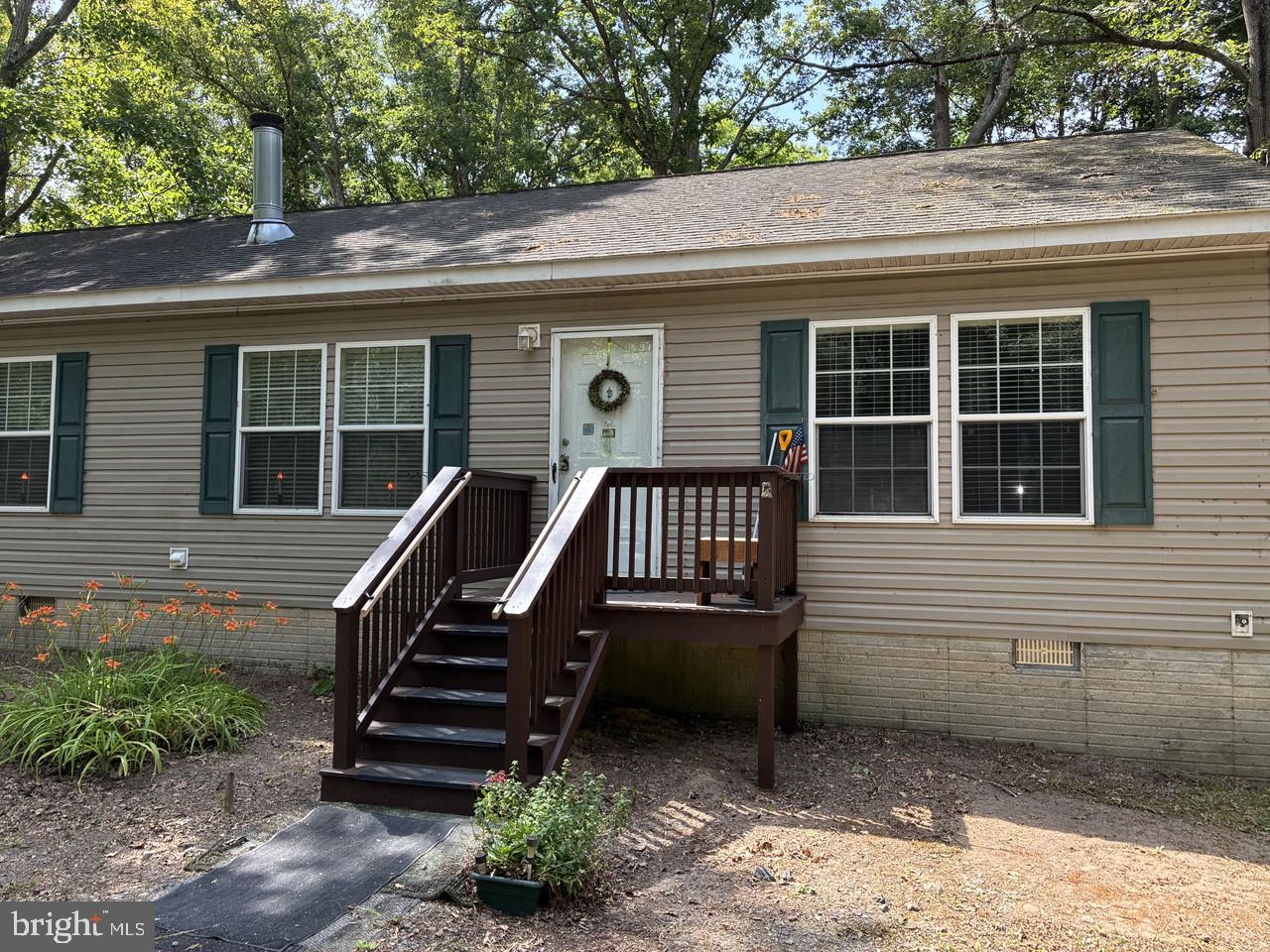 Welcome to this charming, ranch style home on a partially, wooded, 1 acre lot; offering 4 bedrooms and 2 Full baths. Living room with stone, wood burning fireplace for those cozy nights; open to the Kitchen/Dining area. Kitchen with an abundance of cabinetry, walk-in pantry, center island and stainless steel appliances. Laundry/utility/mud room is located off the kitchen with access to the back yard. Primary bedroom with crown molding and walk-in closet; bath has separate shower & soaking tub and double vanities. 3 additional bedrooms with ample closet space. Outside you'll find a 10 x 20 shed for all your storage needs. Come enjoy country living; yet close to highways, farmers market, shopping & restaurants!