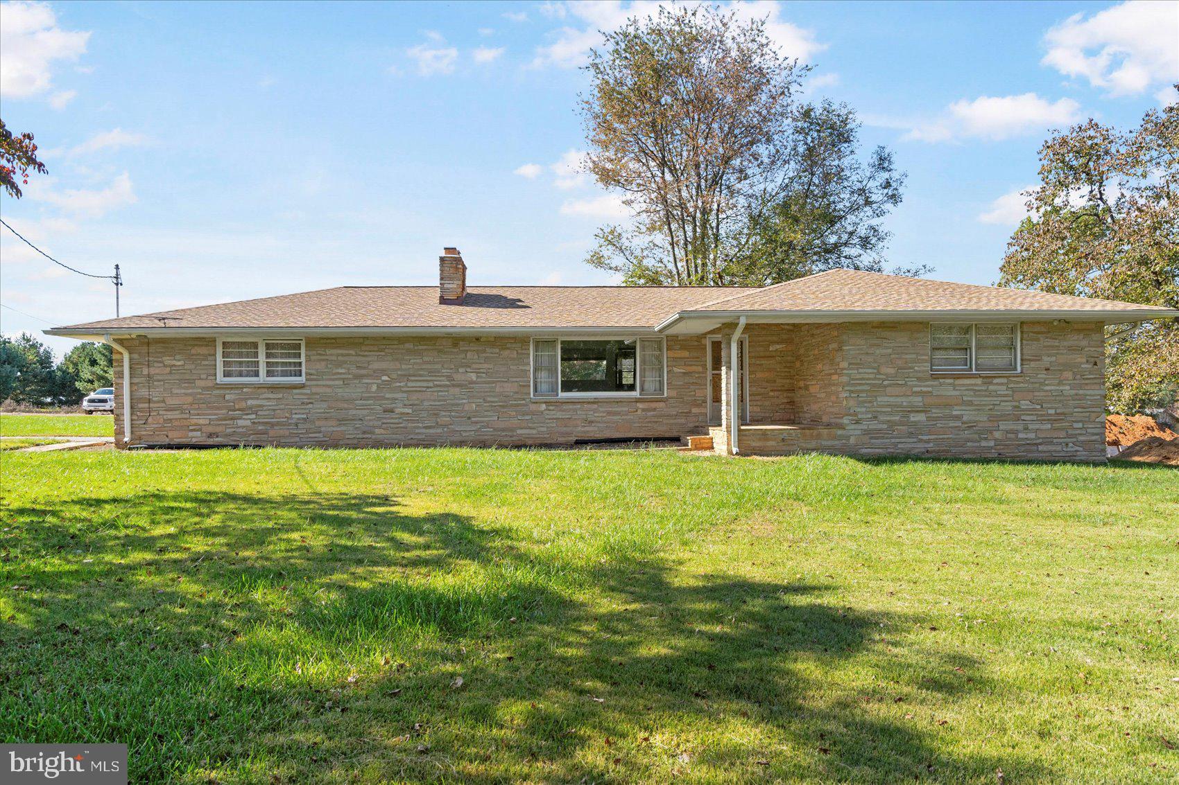 This beautiful custom-built rancher sits on a spacious .54 +/- acre lot just minutes from everything Bel Air has to offer.  Enjoy one-level living in this 3 bedroom 2 full bath home with an oversized two car side load garage.  Enjoy your morning coffee or an evening cocktail on the covered front porch.  Take a peak under the wall-to-wall carpet in the three spacious bedrooms and you'll find the original hardwood floors.  The 1200 sq ft basement is awaiting your finishing touches.  The home has a 3-year-old roof, a brand new oil tank, and has been recently connected to public water and sewer.