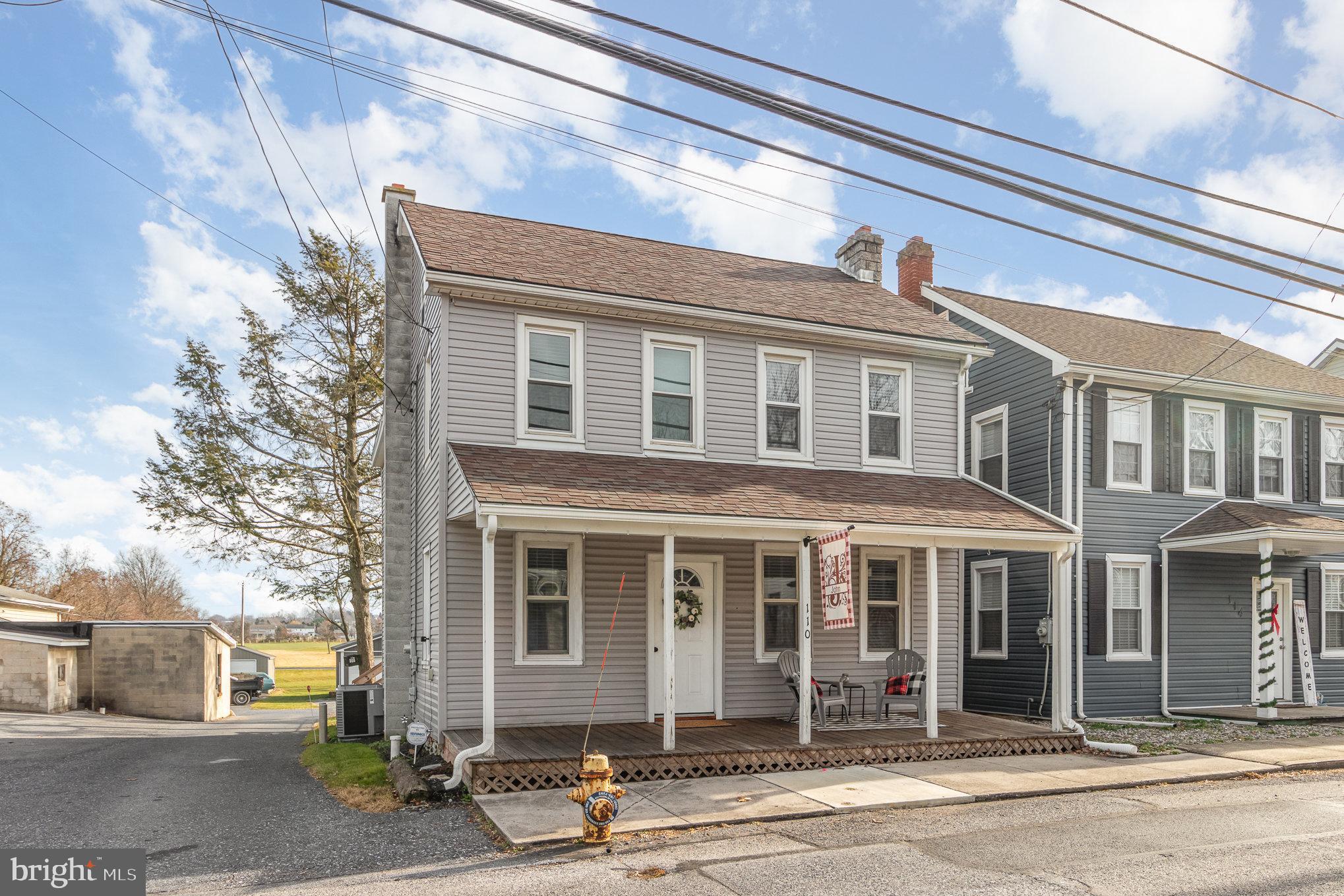 Step into this charming, traditional two-story house that seamlessly blends classic design with modern upgrades. Nestled in the highly sought-after Palmyra school district, this home boasts a spacious front porch, perfect for relaxing and enjoying the neighborhood. The first floor welcomes you with a dining room, living room, and a versatile kitchen flex area. Additionally, there is a convenient half bath and laundry room combination. Ascend to the second floor, where you will find three cozy bedrooms and a full bathroom. The third-floor attic offers endless possibilities, whether you envision it as a den, playroom, or simply extra storage space. 
Outside, the backyard beckons with its expansive deck, ideal for hosting gatherings and creating lasting memories. The small fenced-in yard provides privacy and a safe space for children or pets to roam. To top it off, an oversized two-car garage awaits, providing ample storage for all your needs. Situated on a generous 0.24-acre lot at the end of a peaceful street, this home offers tranquility and privacy. Whether you are a first-time homebuyer, relocating, or simply seeking a fresh start, this home has it all. It exudes a touch of class, elegance, and most importantly, a place to call your own. Welcome home to a life of comfort and contentment.