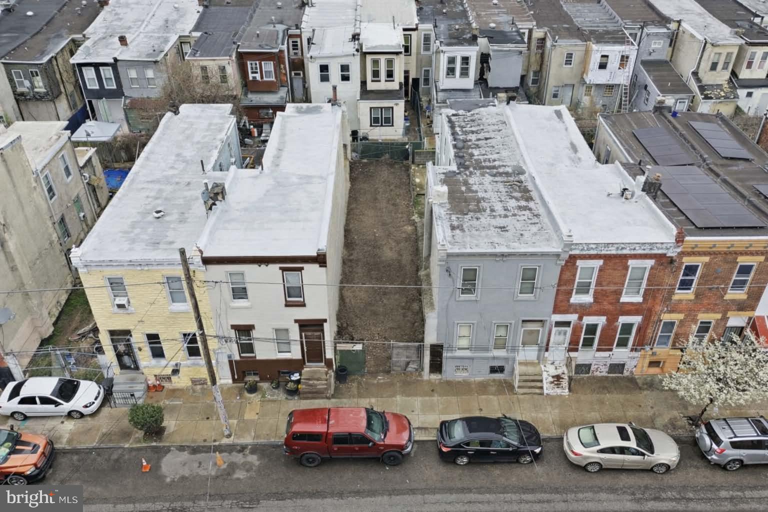 17x66 (1,128 SF) RM1-zoned vacant lot. Build single-family, duplex, or multi-family by right. Strong new construction opportunity. Delivered clean and ready for development.
