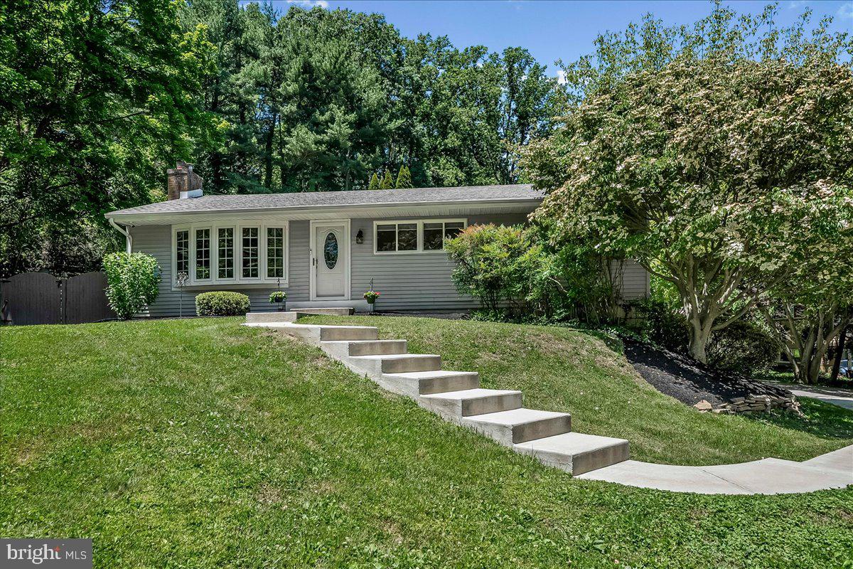 Welcome to 207 Walter Drive, a beautifully updated 3-bedroom, 2.5-bath ranch home tucked away on a quiet cul-de-sac in highly desirable Media and the award-winning Rose Tree Media School District. Set on approximately half an acre, this home offers the perfect balance of privacy, outdoor living, and convenient access to everything downtown Media has to offer. Inside, a bright and inviting floor plan is filled with natural light and features original hardwood floors, a spacious living room with a cozy fireplace, and a new bay window that creates a warm and welcoming atmosphere. The eat-in kitchen is designed for both everyday living and entertaining with tile flooring, pantry cabinetry, stainless steel appliances, recessed lighting, and a breakfast bar that opens to the dining area. The main level also includes a private main bedroom with an updated en-suite bath featuring tile flooring, skylight, and shower stall, along with two additional bedrooms and a full hall bath.

The fully finished lower level provides exceptional additional living space, complete with a built-in bar perfect for entertaining guests, hosting game days, or creating the ultimate family room retreat. A powder room, laundry area, and abundant storage make the basement both functional and versatile, with possibilities for a home office, gym, media room, or guest space. 

Step outside into your own private fenced backyard oasis featuring an in-ground pool with a brand-new liner, expansive paver patio with inset lighting, beautifully landscaped grounds, and a large two-level wooden deck ideal for outdoor dining, relaxing, and summer entertaining. Recent upgrades add tremendous value and peace of mind, including conversion to propane heat with a brand-new heating system and a new Generac whole-house generator. Located just minutes from downtown Media, SEPTA regional rail, Routes 1, 76, 476, and 95, and Philadelphia International Airport, this home offers easy commuting while keeping you close to Media’s renowned restaurants, boutique shopping, Trader Joe’s, parks, and year-round community events. Don’t miss this rare opportunity to own a move-in ready ranch home with incredible indoor and outdoor living spaces in one of Delaware County’s most sought-after locations.