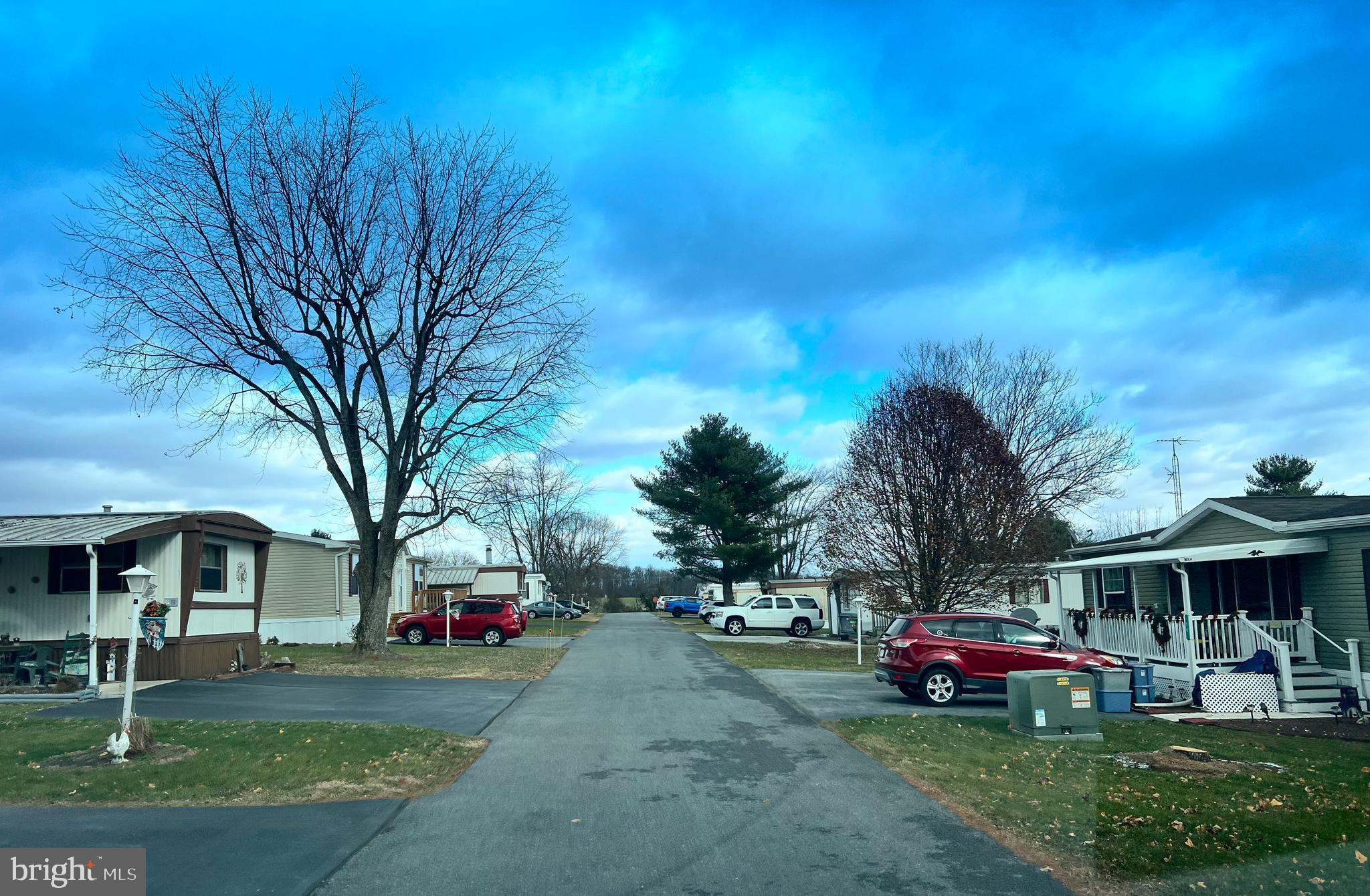 This property features 12.46 acres, 55+ mobile home community with 45 rental
pads, a farmhouse with 2 apartments and management office space. This mobile
home community also has a private well water system and a wastewater treatment plant.