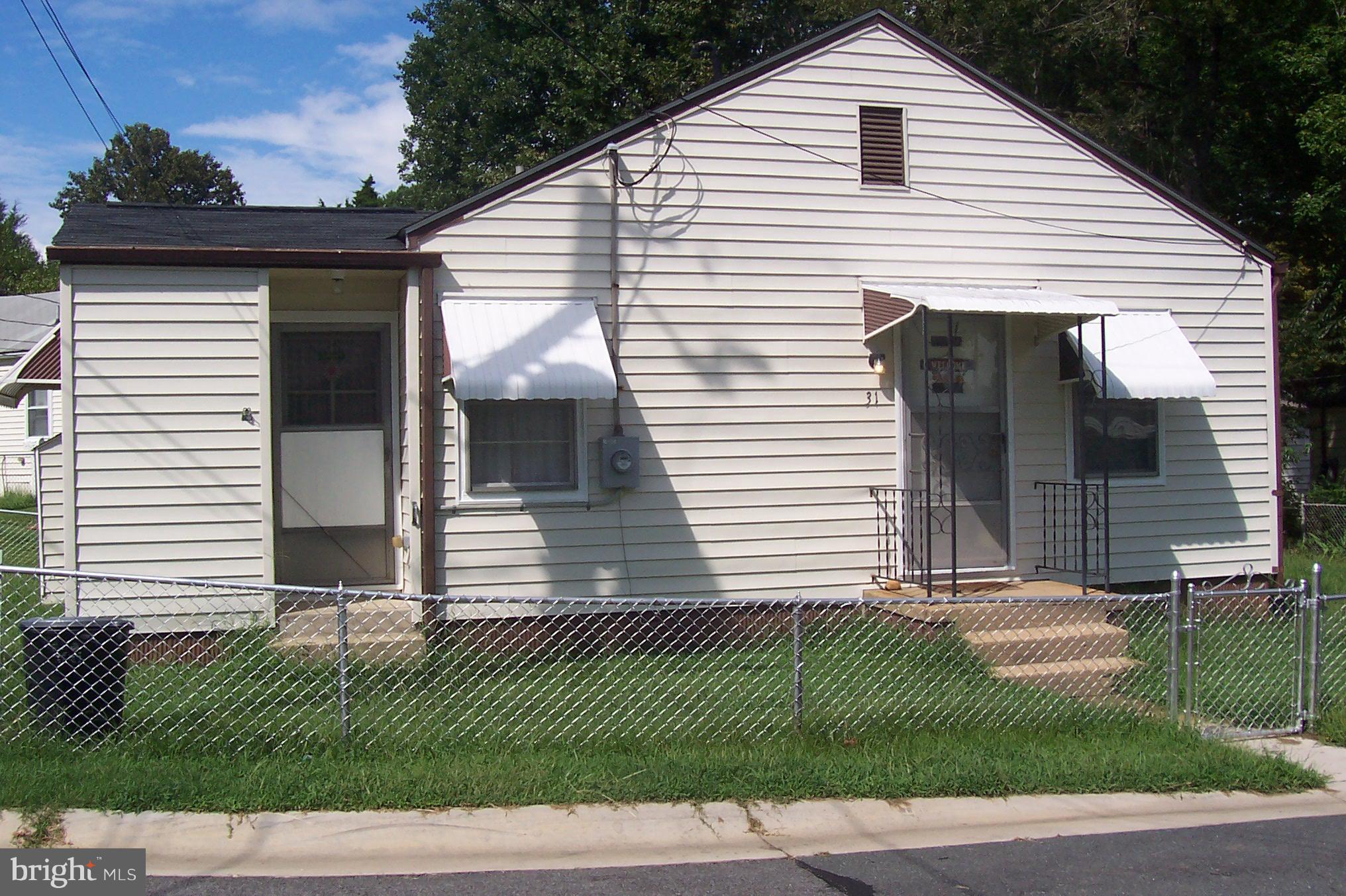 Well maintained duplex in Potomac Heights. 2 bedrooms and 1 bath. Separate laundry room. This is a cooperative community. Buyer must be approved for membership and use approved lender. Pick up a buyers packet from the housing office for information about purchasing this unit. Buyer must be approved for membership and also approved with the lender before submitting an offer.