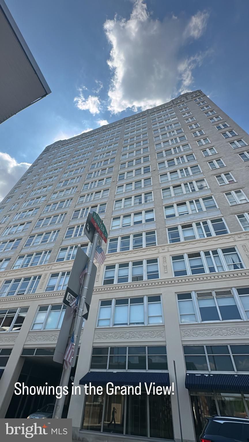 Unit #404 at Chinatown's Grand View Condominiums is a sun-soaked, updated residence offering 3 bedrooms, 2 full bathrooms, and lots of space. The building's amenities include a welcome desk staffed 24/7, elevator access, a modern fitness center, on-site laundry, an outdoor garden, a dog run, a community lounge, and guest parking. Stepping inside the unit, you're immediately taken by the abundant natural light from the east-facing oversized windows. The entry foyer has storage closets, while the open kitchen to the left is fitted with generous cabinet and counter space and a full suite of appliances, including a dishwasher. To the right is a large full bathroom. Gleaming hardwood floors extend into the bright and airy living room, where you'll find plenty of space to create a functional layout. The huge primary suite has more tall windows, a walk-in closet, a second reach-in closet, and an attached full bathroom. Another sun-lit bedroom with a walk-in closet completes the home. In addition to everything inside, this fantastic location earns a near-perfect Walk Score of 99! Chinatown is brimming with top-rated restaurants, popular shops, local markets, and lively entertainment. Reading Terminal Market, the Fashion District, City Hall, and Franklin Square Park are all a few blocks away. There's also easy access to public transit, Broad St, I-676, I-76, I-95, and South Jersey. Schedule your showing today!