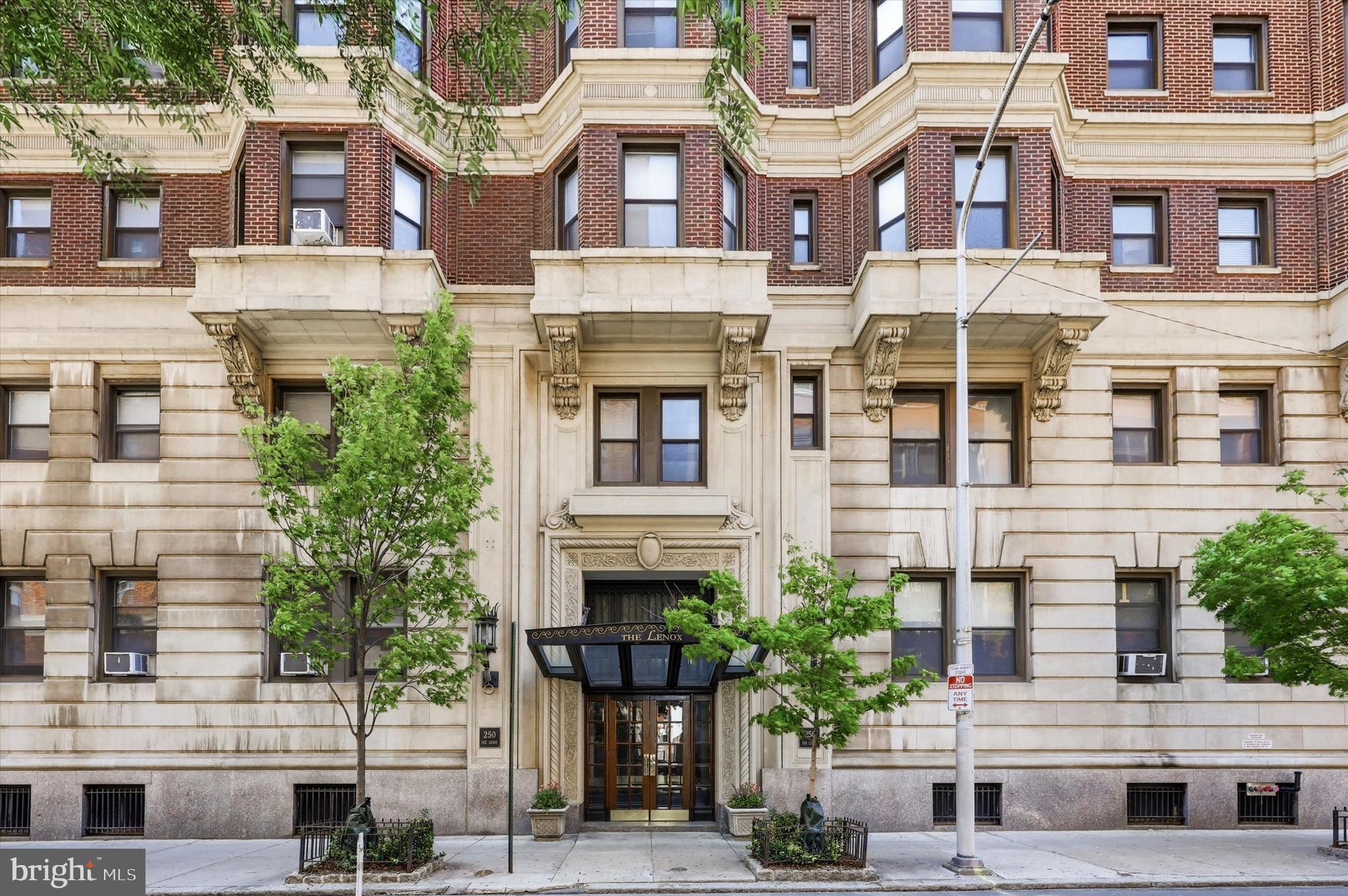 This is city living at its finest! Located inside The Lenox, the elegant 8th-floor condo features a spacious layout, high ceilings, abundant windows, and original architectural details. Walk through the foyer and into the meticulously kept one-bedroom unit—one of the largest in the building—to find high ceilings, recessed lighting, and an open floor plan. 

The gourmet kitchen is a standout with panel-covered appliances, showcase cabinets, basketweave backsplash, Wolf, and Bosch appliances. Here, a large island adds informal dining space that's perfect for breakfast or intimate entertaining. For more formal sit-downs, the large dining room is open to the kitchen, making every meal seamless—from oven to table. The family room is also connected to this area, where you'll also find a closet leading to the in-unit laundry. There is also a half bath with a wallpaper mural. 

The condo features a large primary suite with built-in shelving and drawers, as well as a dedicated TV space, and a walk-in closet. Here, find an ensuite with a walk-in shower and marble flooring.

Other details include custom millwork and panoramic views to the South and East.